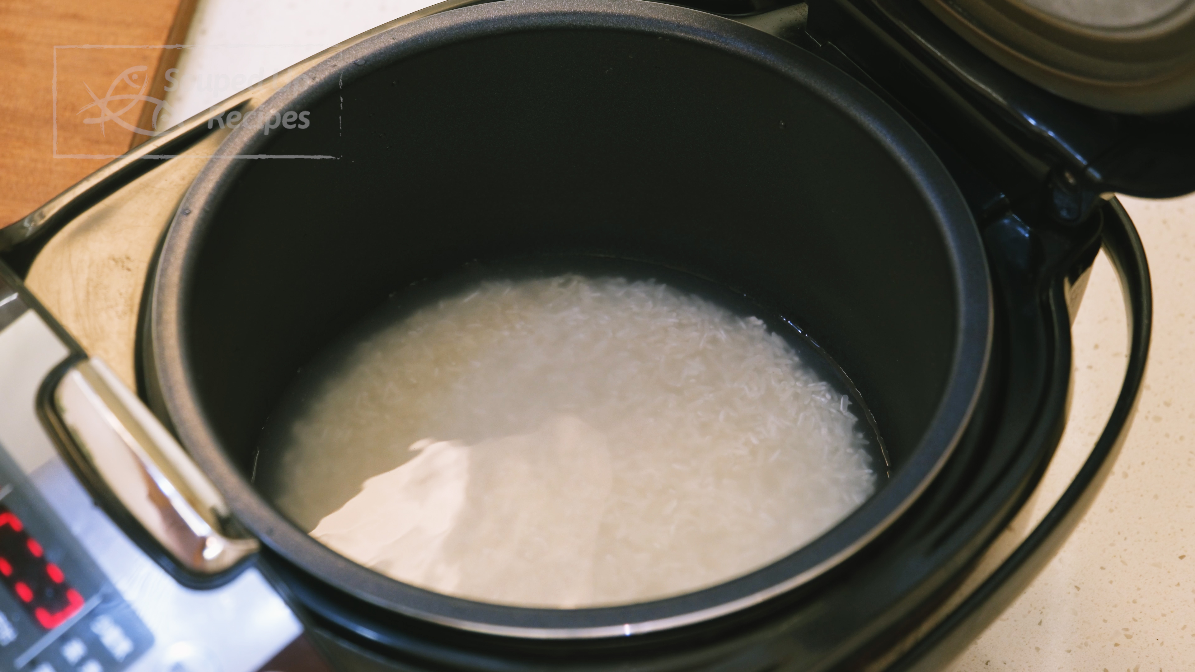 Image of Rinse one cup of rice a couple of times and...