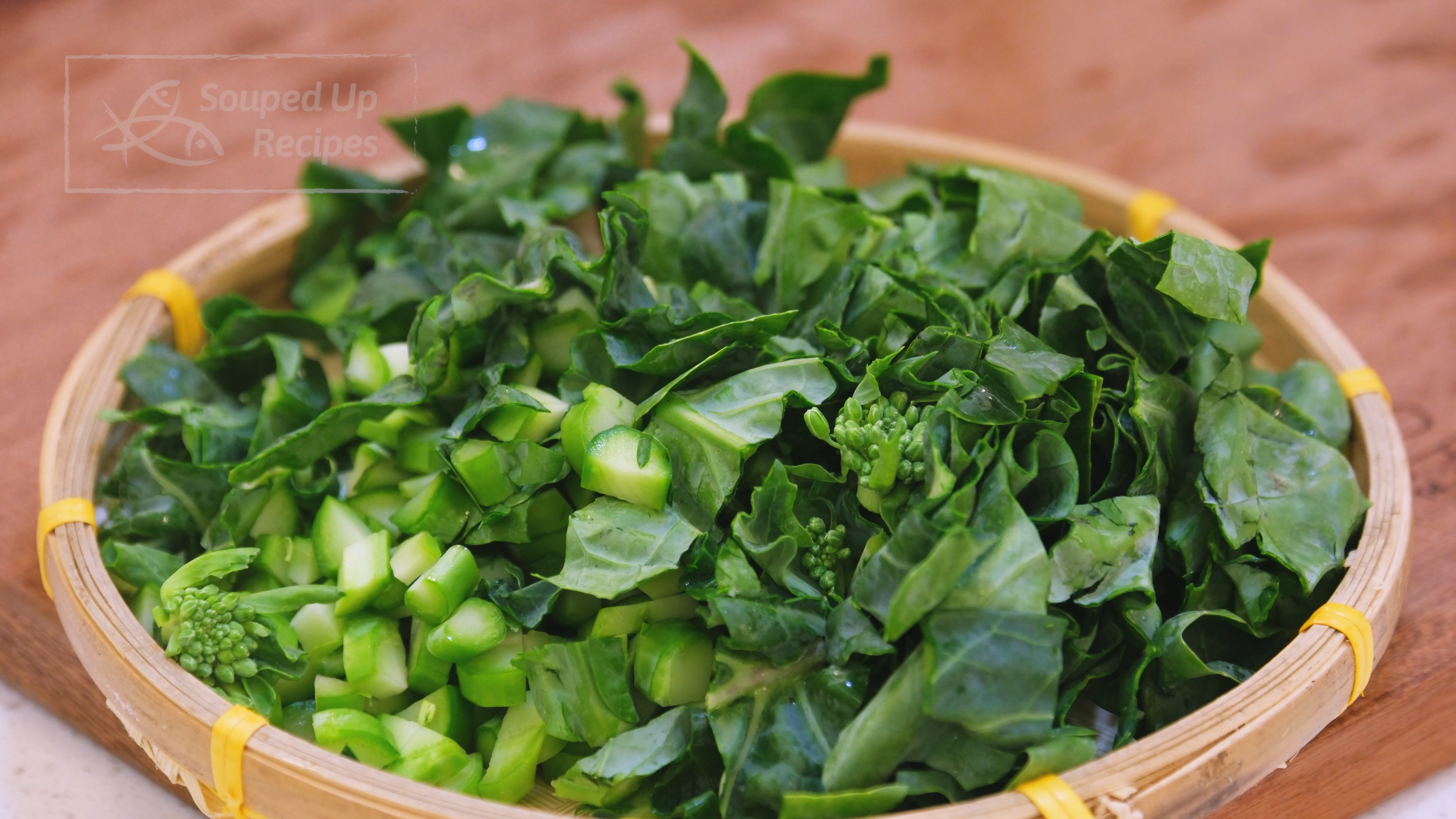 Image of Gailan (Chinese broccoli) has thick stems, so quarter the stems...