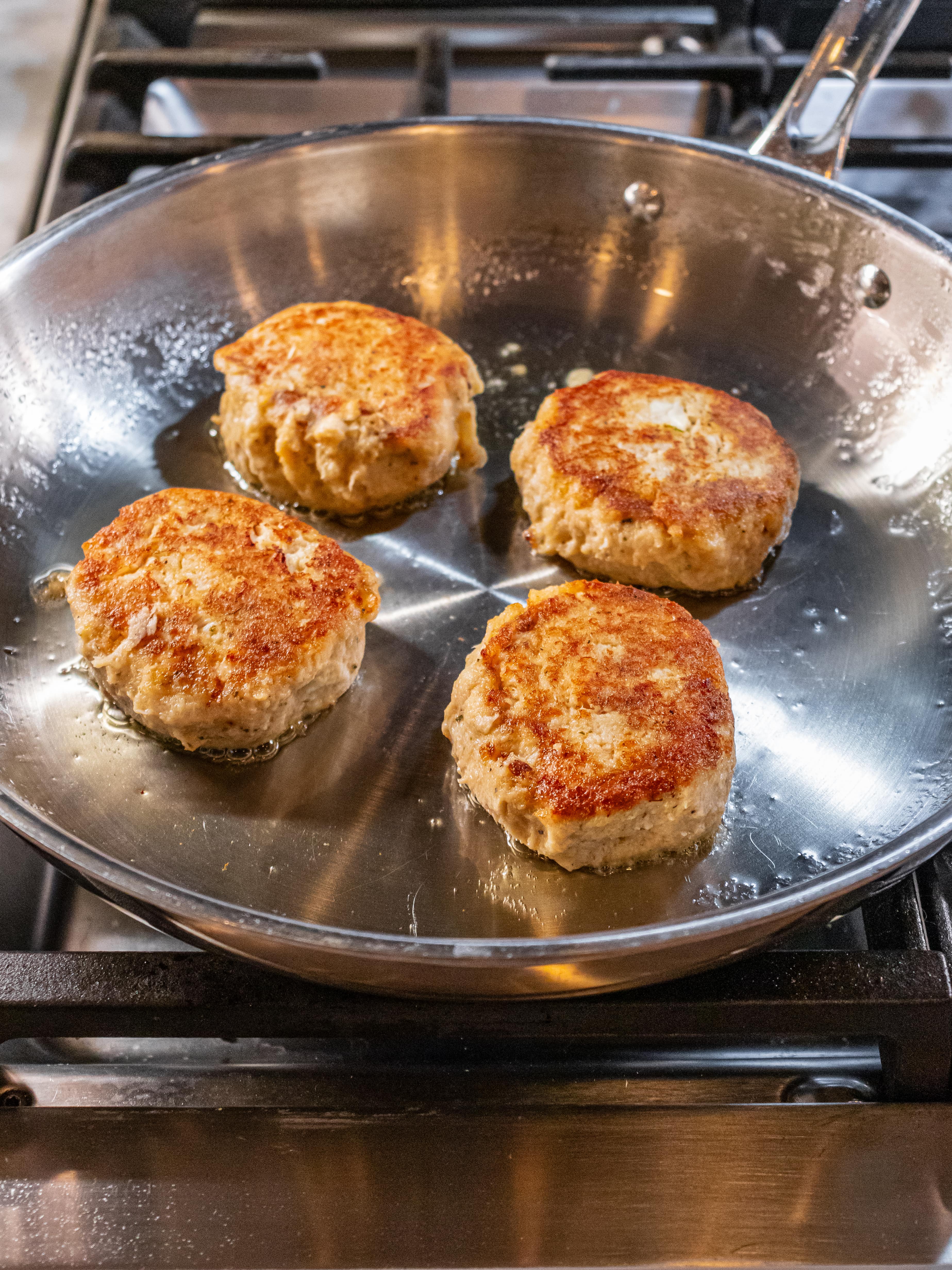 Image of Heat oil over medium heat in a large skillet. Once...
