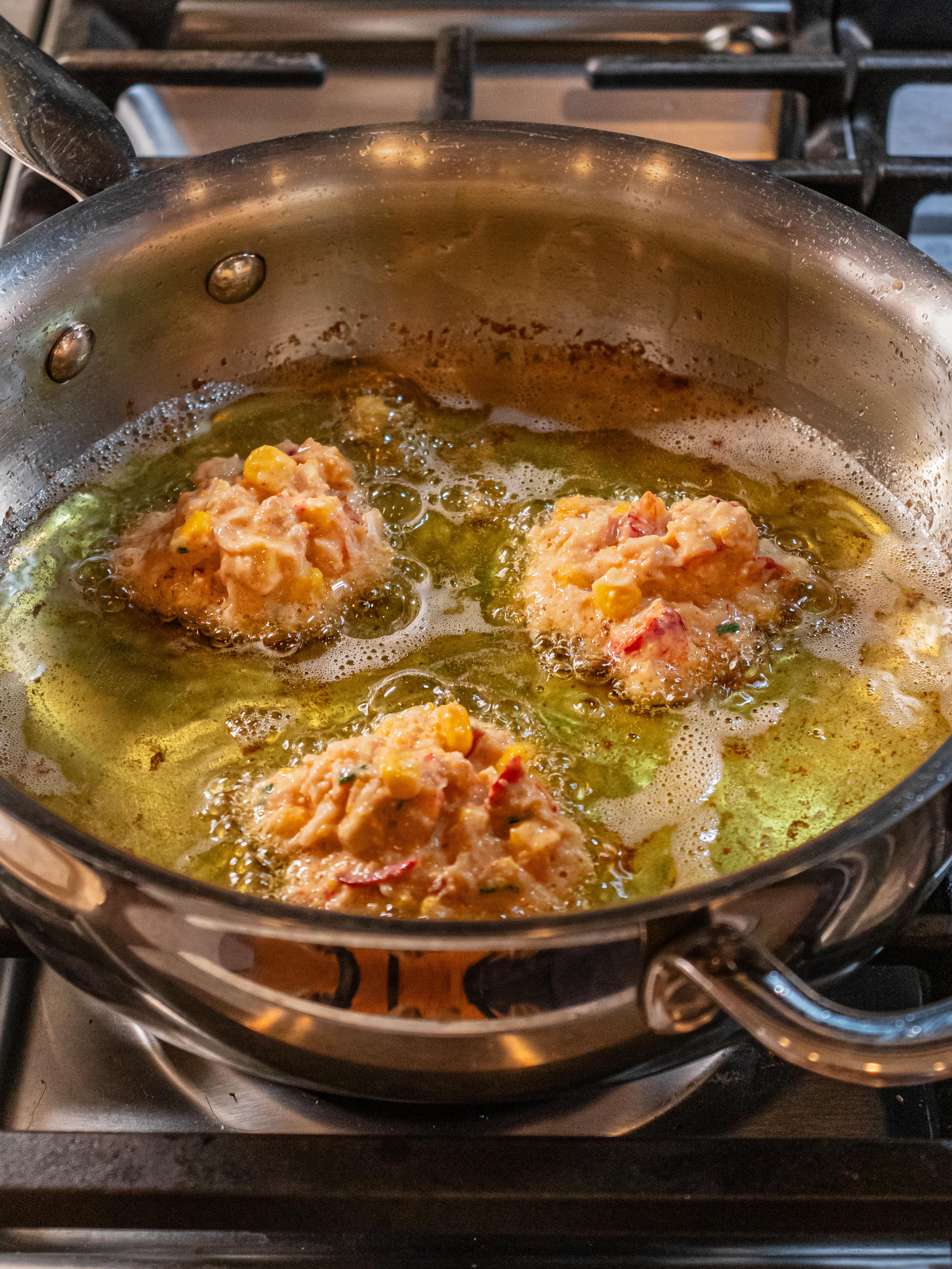 Image of Heat 2-inches of oil in a deep skillet to 365ºF....