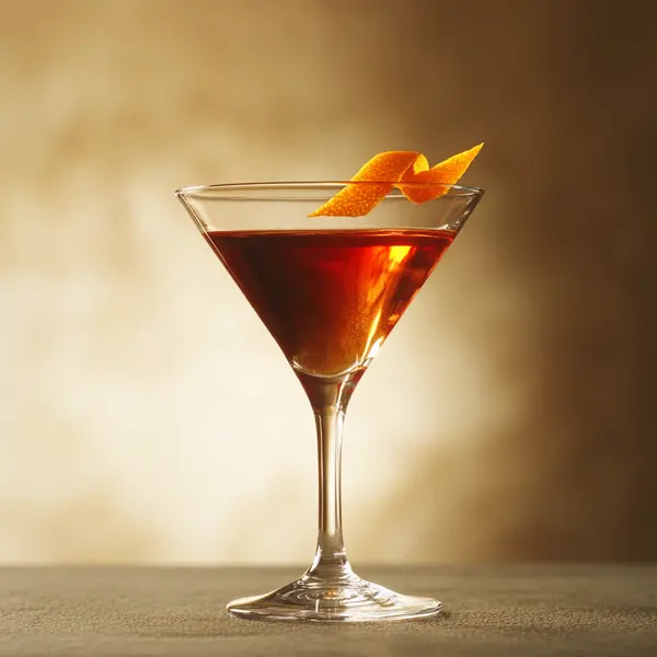 A photo of the Vermouth Spritzer cocktail containing Martini & Rossi Rosso Sweet Vermouth, Noilly Prat Dry Vermouth, Club soda in a Martini.