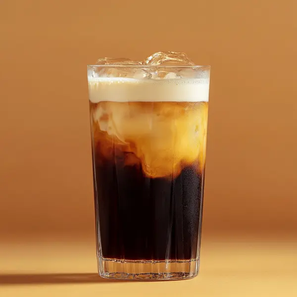 A photo of the Rum and Buzz cocktail containing Planteray 3 Stars White Rum, Mr Black Cold Brew Coffee Liqueur, Milk, Single cream / half-and-half, Coca-Cola in a Collins.