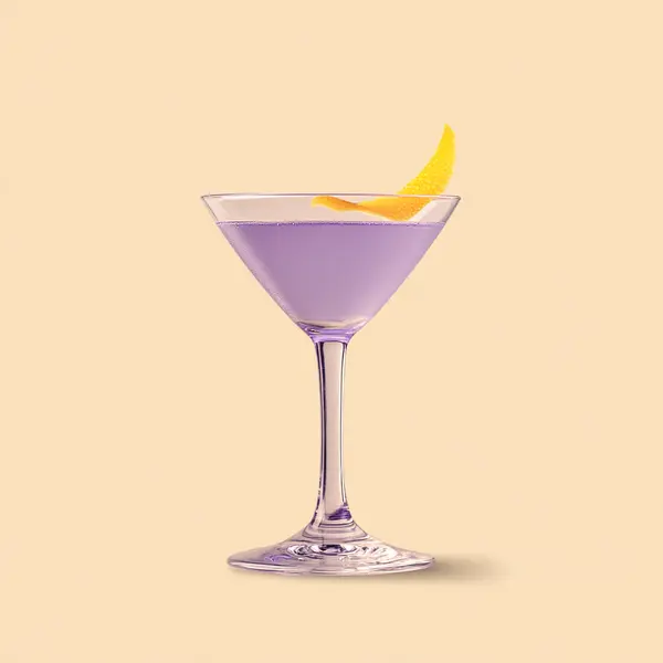 A photo of the Lavender Kiss cocktail containing Beefeater London Dry Gin, Giffard Crème de Violette Liqueur, Freshly squeezed lemon juice, Rose water, Chilled water (reduce if wet ice) in a Martini.