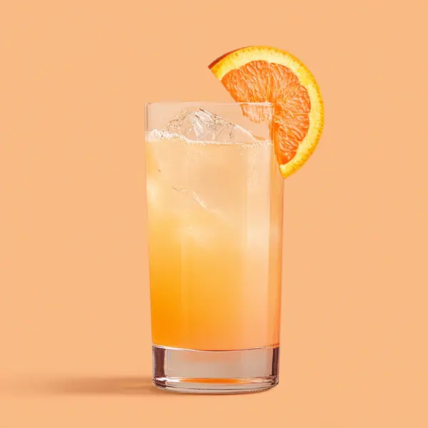 A photo of the Citrus Gin Glide cocktail containing Beefeater London Dry Gin, Freshly squeezed orange juice, Freshly squeezed pink grapefruit juice in a Collins.