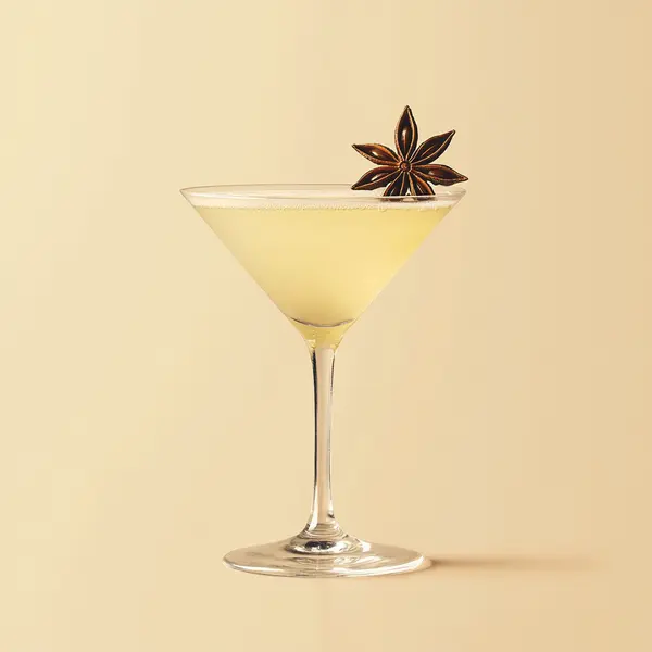 A photo of the Minted Muse Martini cocktail containing Beefeater London Dry Gin, Noilly Prat Dry Vermouth, Pernod Absinthe, Tempus Fugit Crème De Menthe in a Martini.