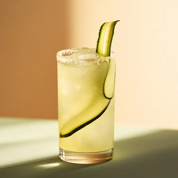 A photo of the Agave Sparkler cocktail containing Del Maguey Vida Mezcal, Patron Silver Tequila, Three Cents Aegean Tonic Water in a Collins.