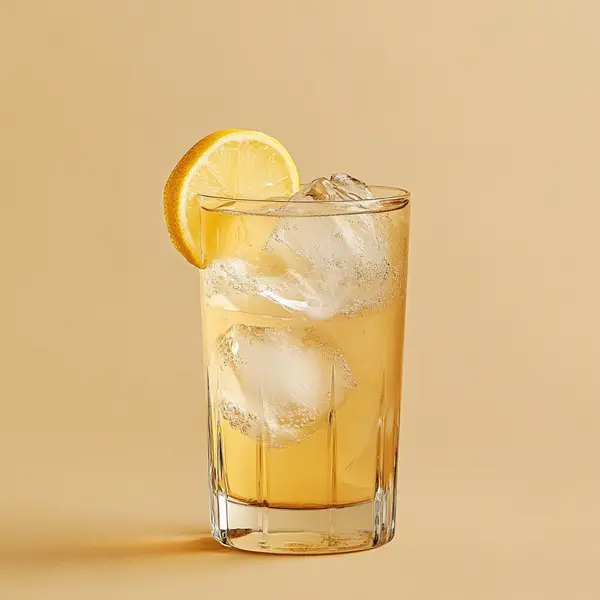 A photo of the Scottish Fizz cocktail containing Compass Box Great King Street Artist's Blend Scotch, Club soda, Ginger ale in a Collins.