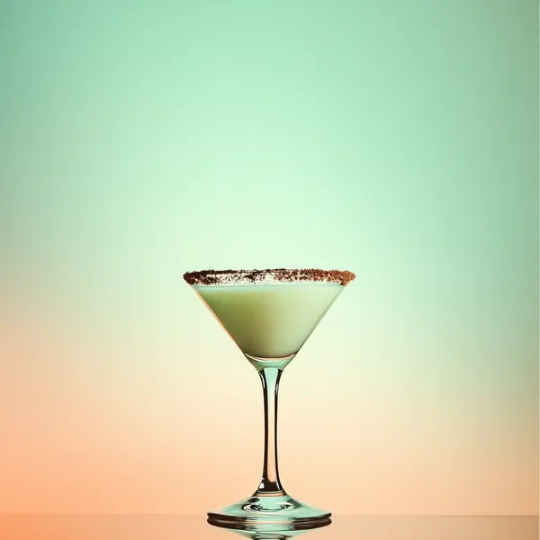 A photo of the Choco-Mintini cocktail containing Ketel One Vodka, Marie Brizard Crème de Cacao White, Tempus Fugit Crème De Menthe in a Martini.