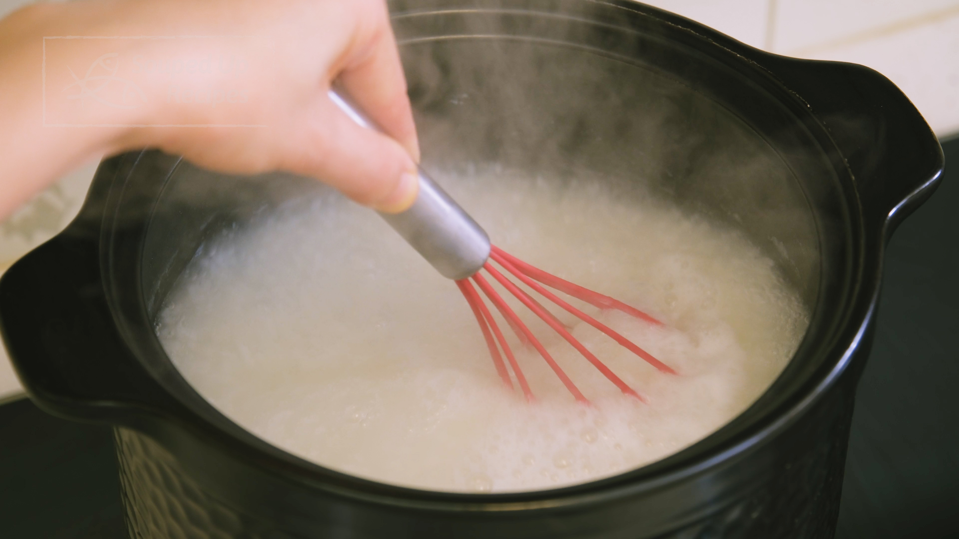 Image of After 20 minutes of simmering, take a whisk and stir...