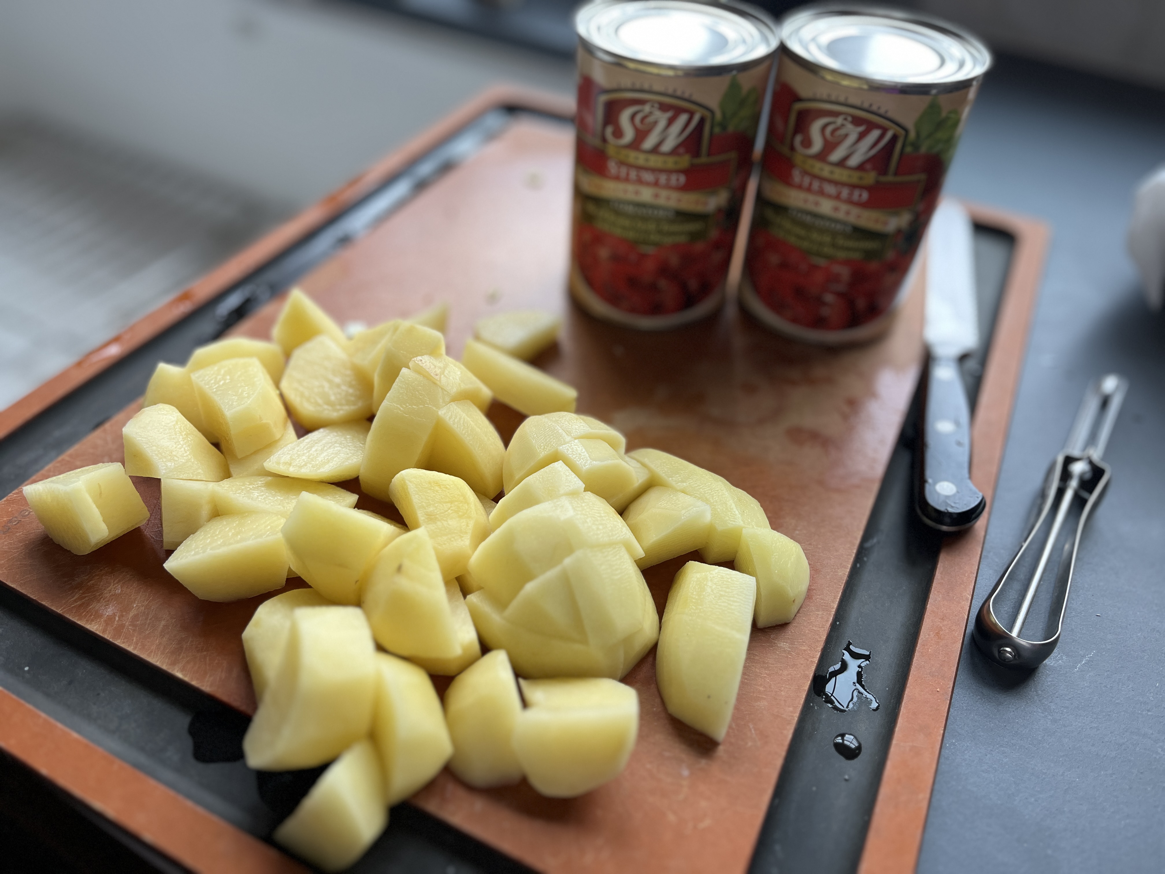 Image of Add the stewed tomatoes, carrots, chicken broth, bouillon cubes and...