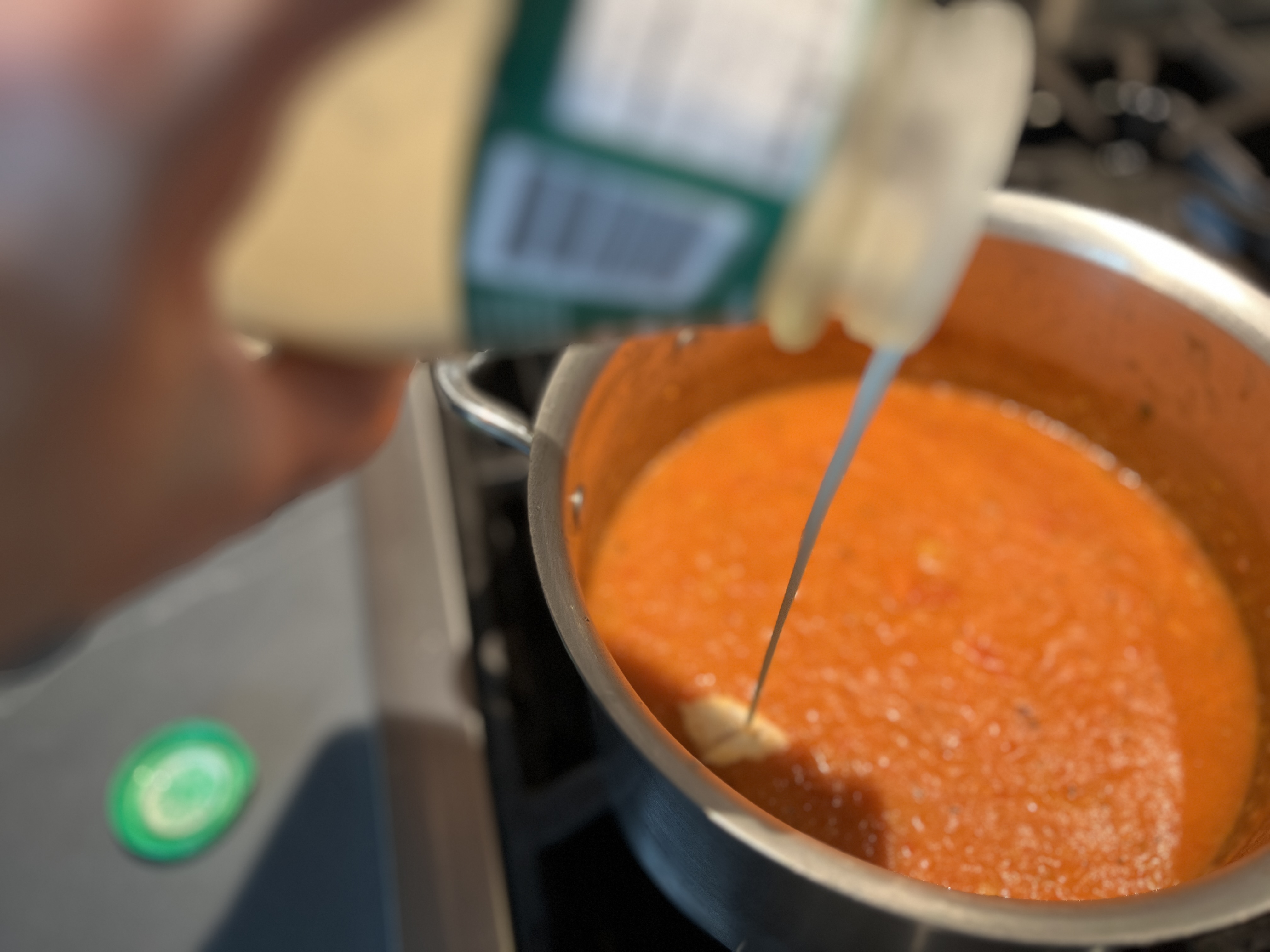 Image of Add the cream to the pan and stir to combine....