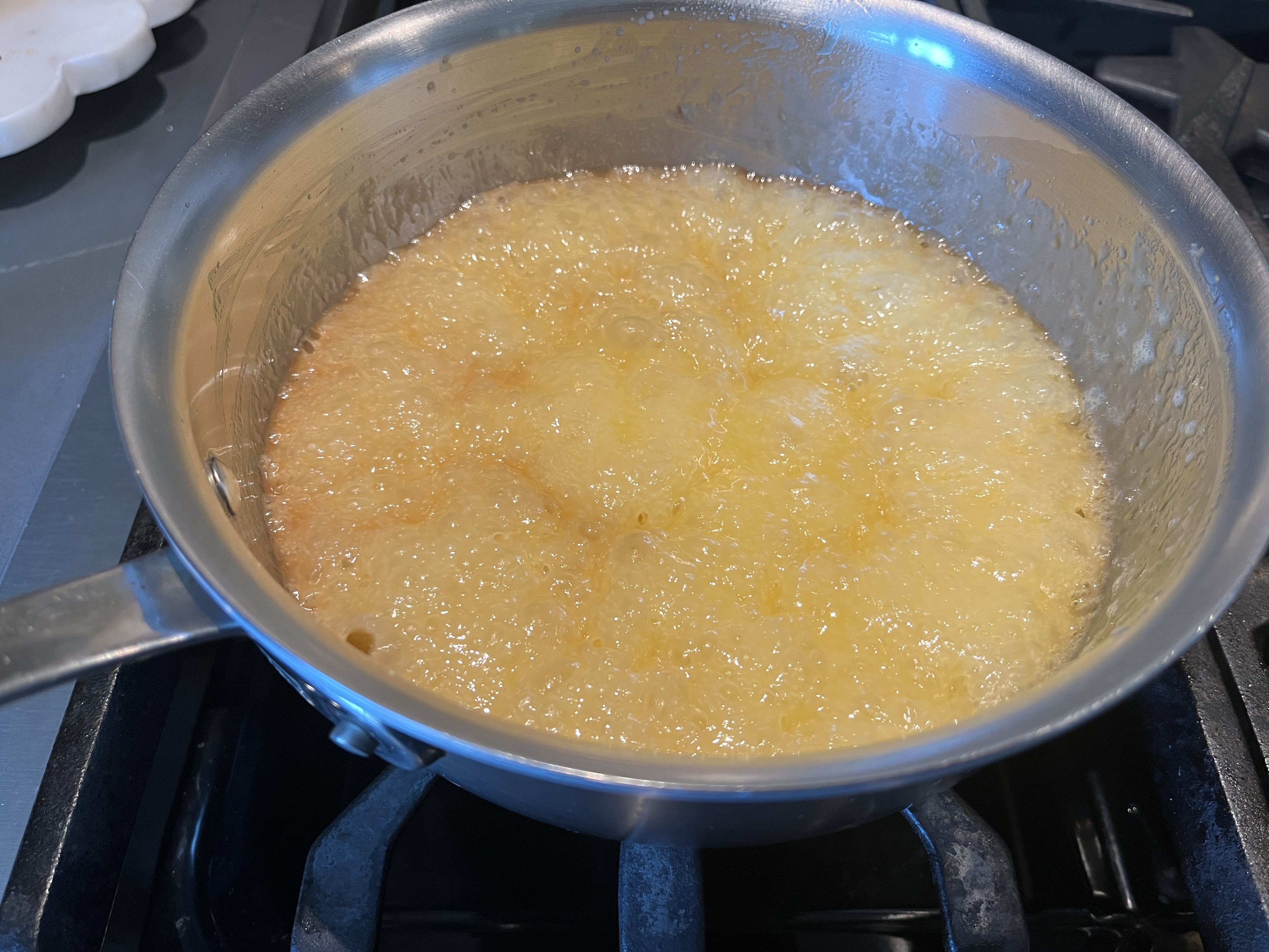 Image of In a heavy pan over medium heat, add the butter,...