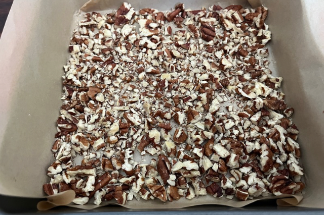 Image of Line a square 9x9 pan or cookie sheet with parchment...