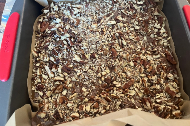 Image of Sprinkle the additional pecans and salt on top of the...
