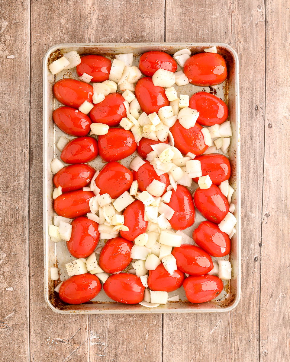 Image of Toss together halved tomatoes, onions, garlic, olive oil, butter, ½...