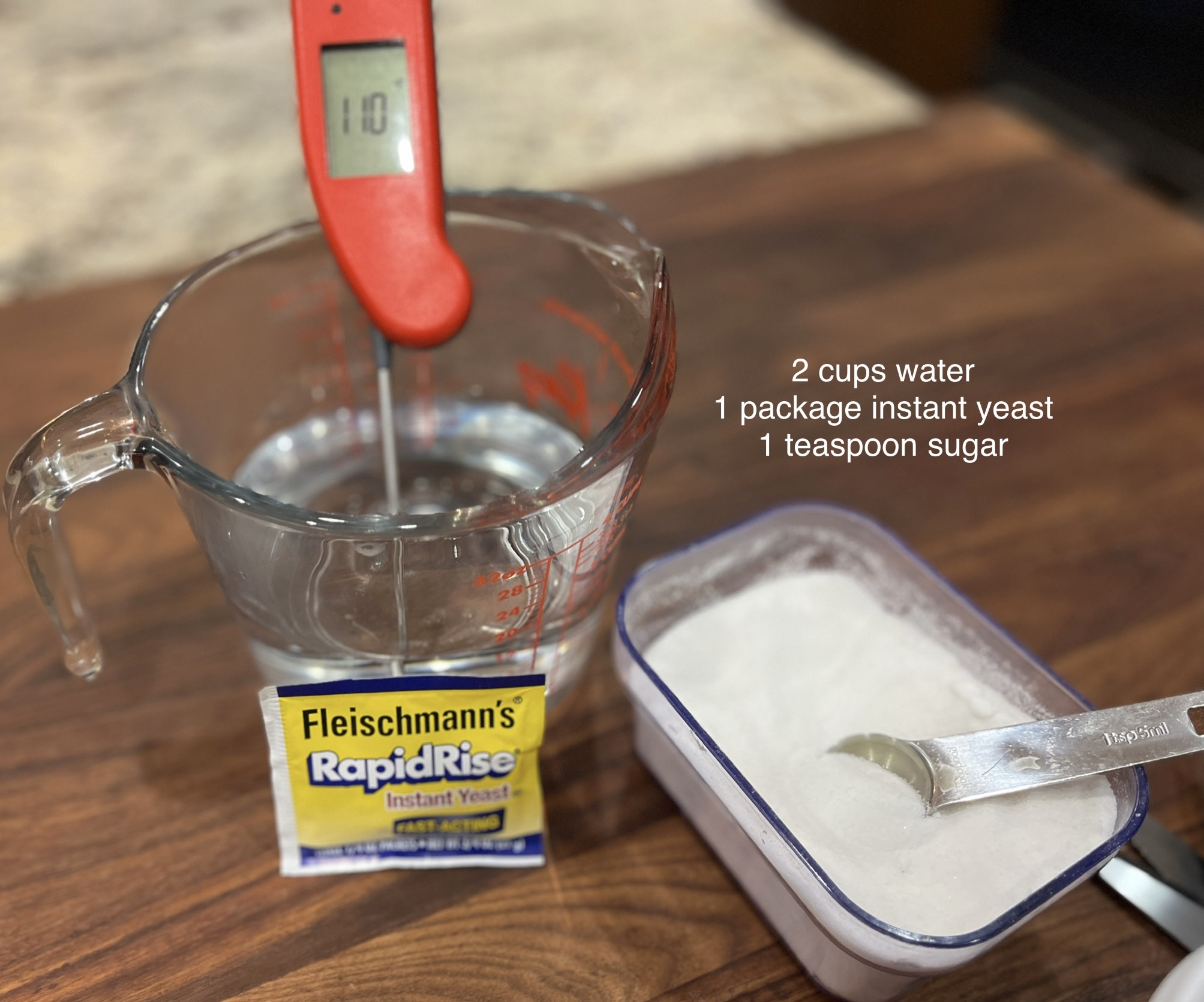 Image of Prepare your yeast by adding 2 cups warm water, with...