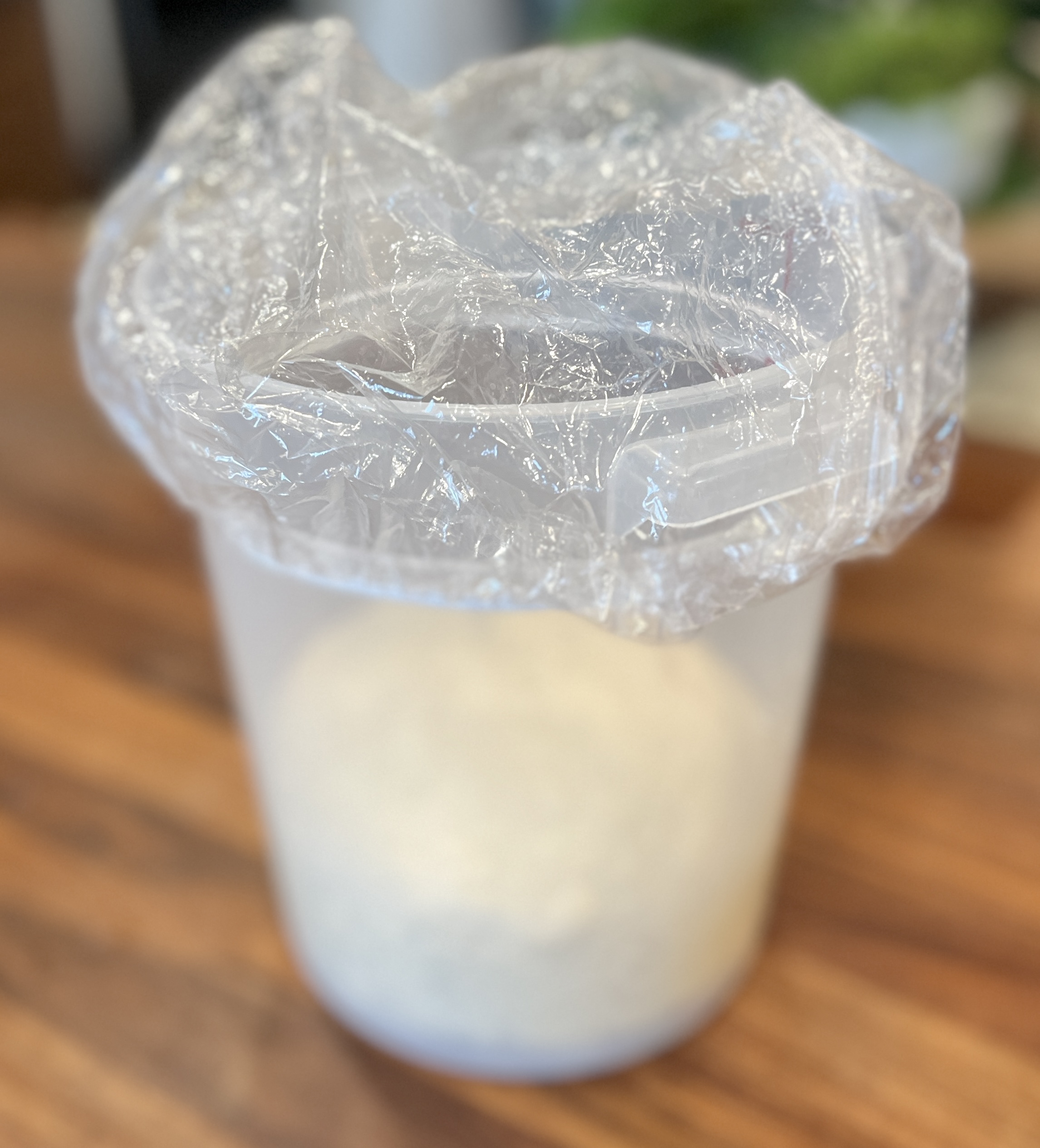 Image of Add dough to a glass bowl or proofing container and...