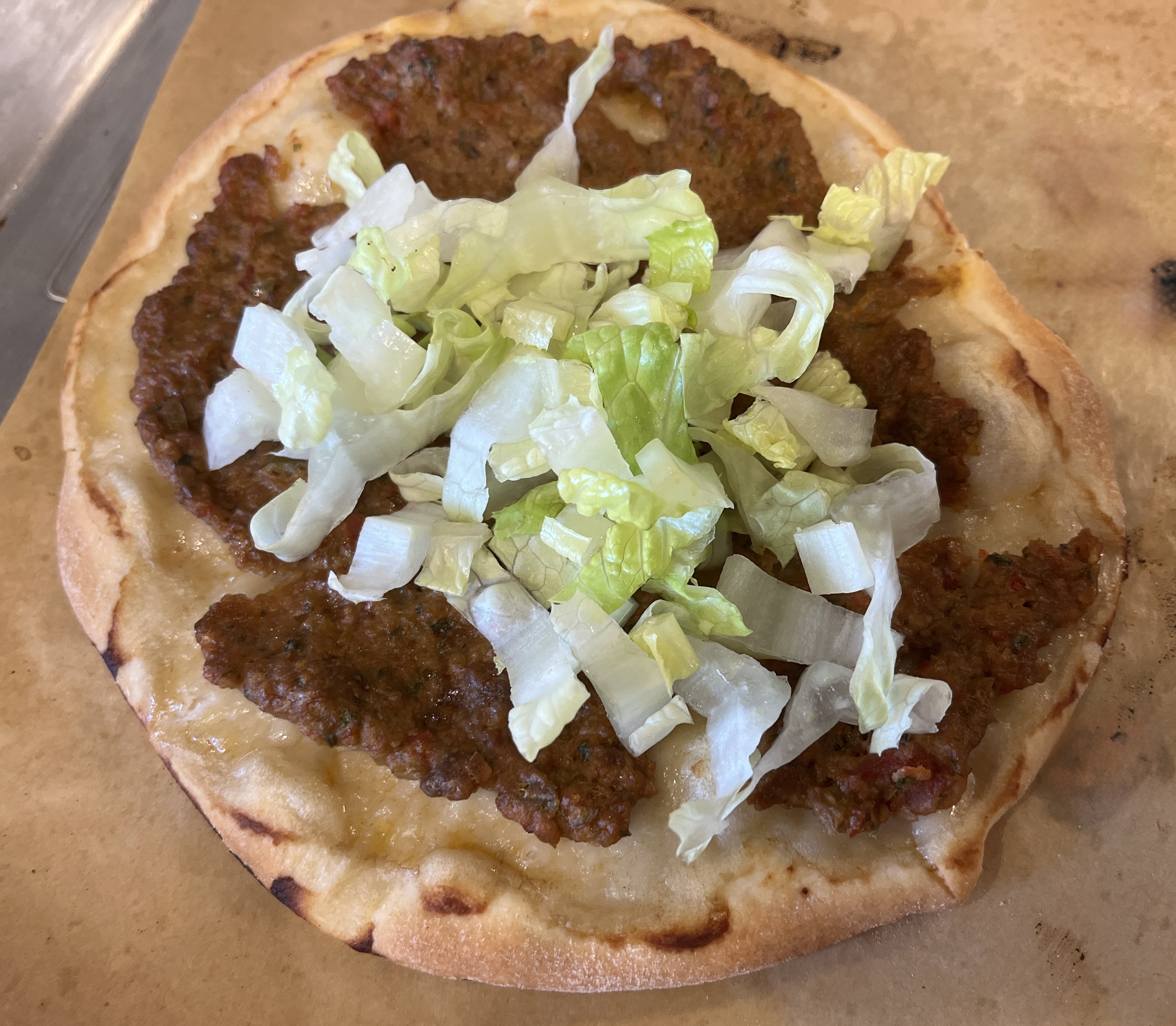 Image of Enjoy with chopped lettuce.