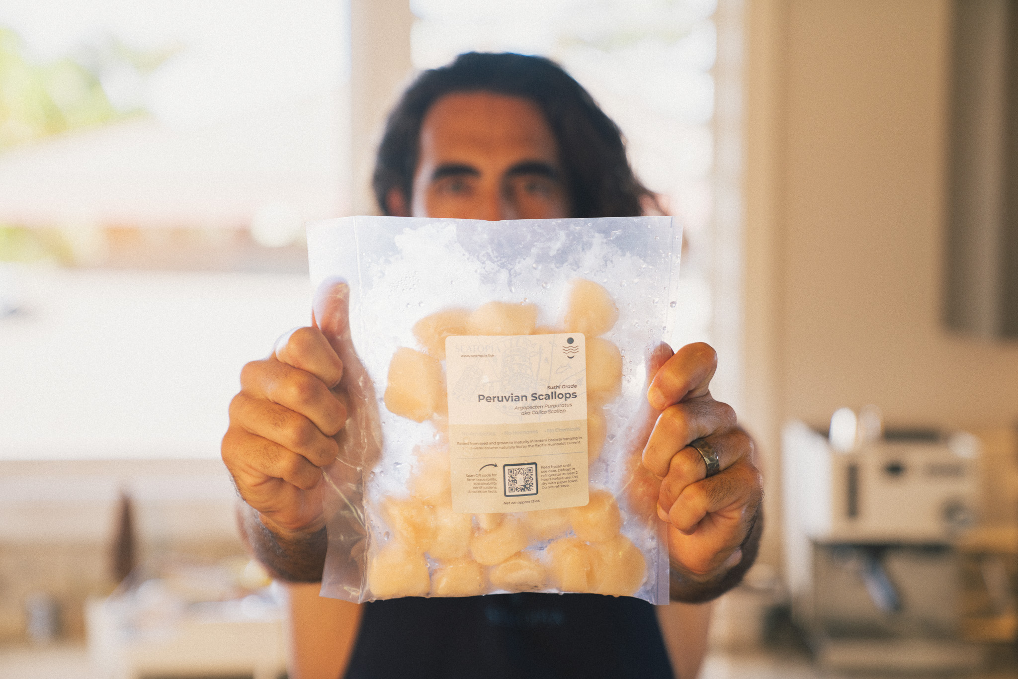 Image of Poach the scallops: Add the room-temperature scallops to the broth....