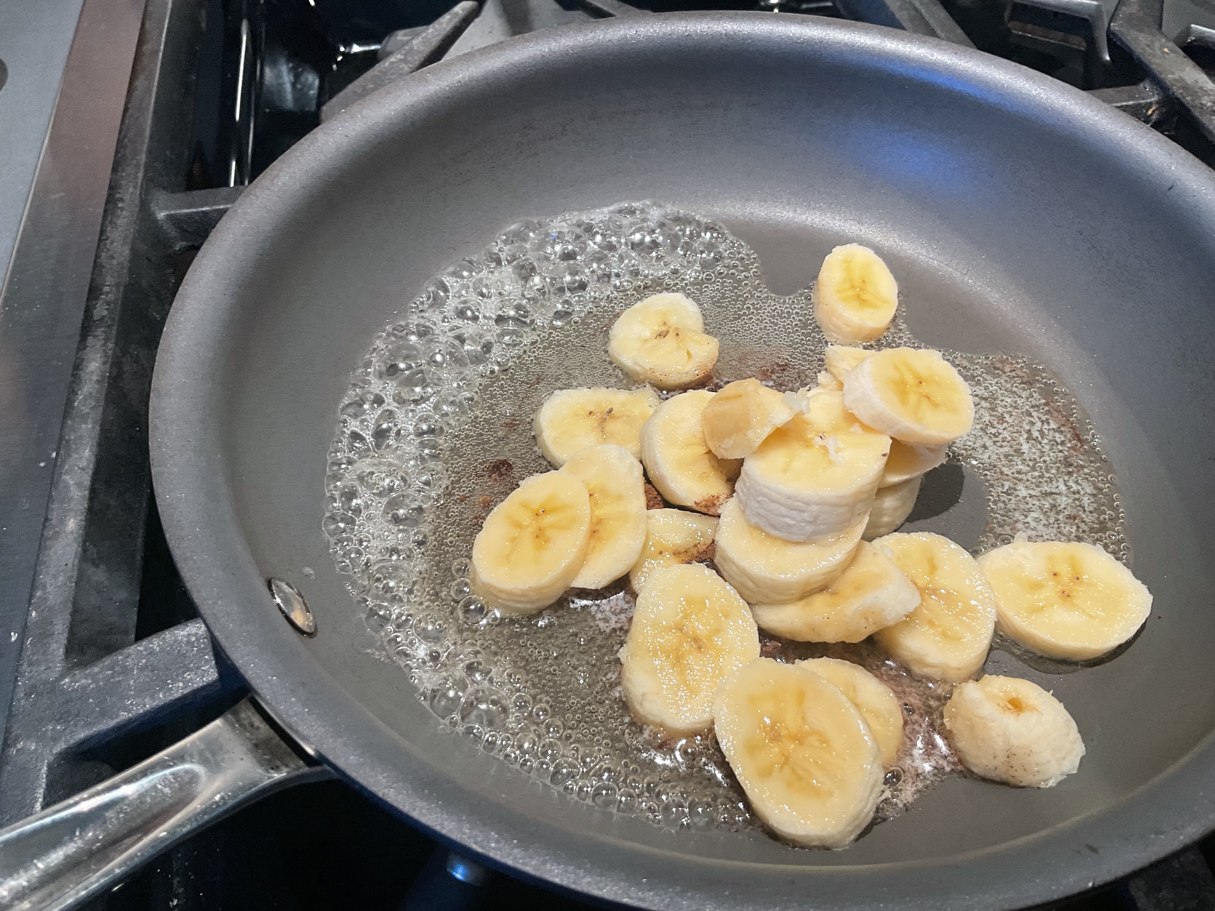 Image of Add sliced bananas and caramelize for 5 minutes. Flip and...