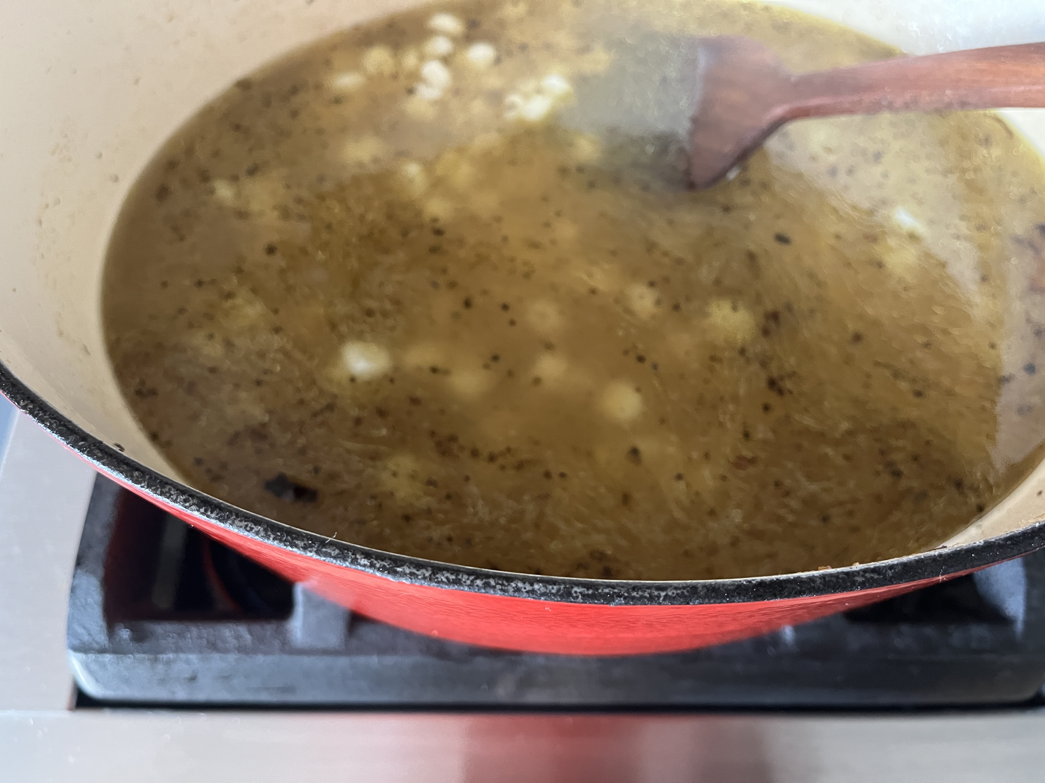 Image of Transfer the puree back into your pot over medium heat....