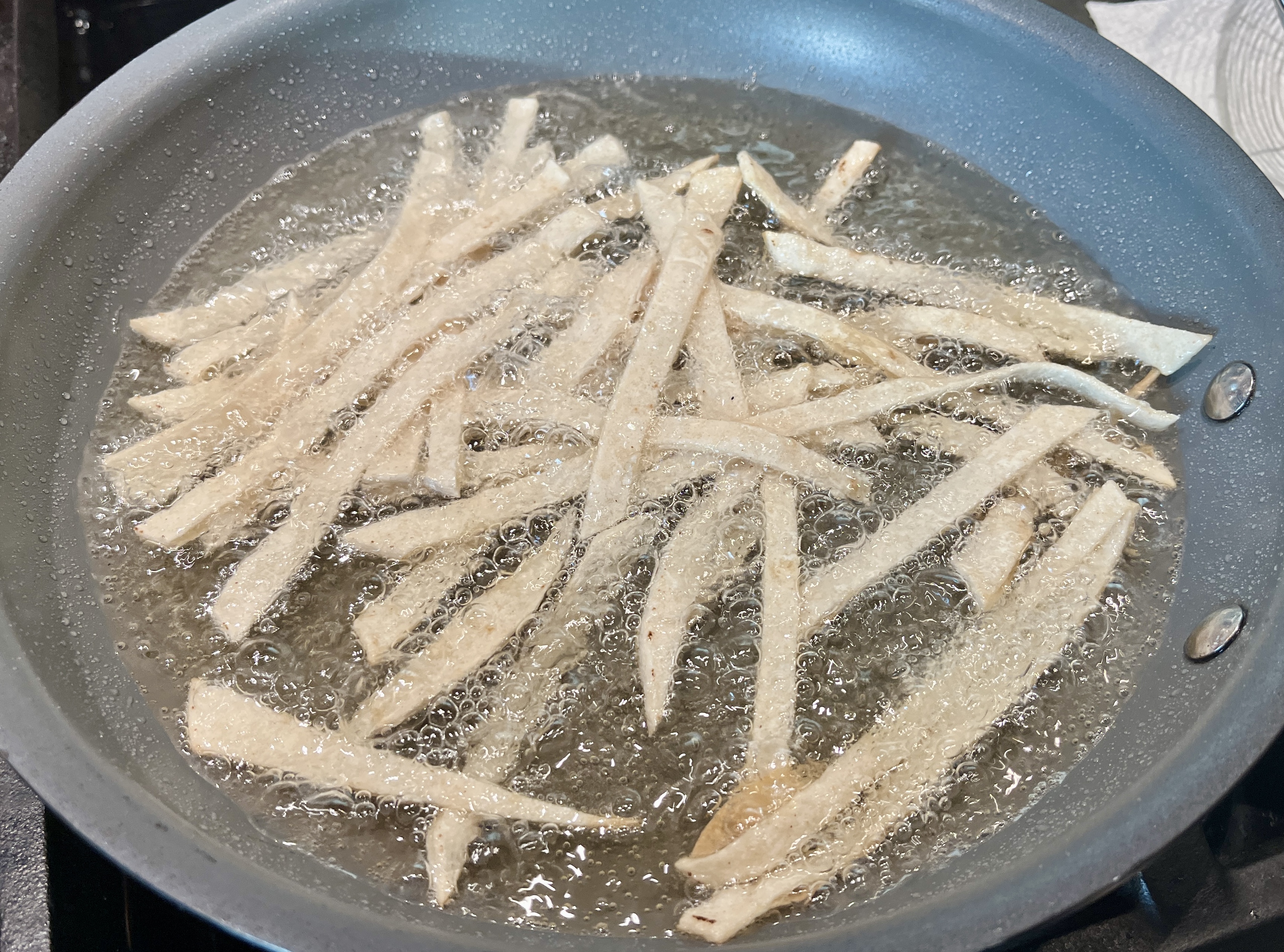 Image of In a deep pan add enough oil to fry your...