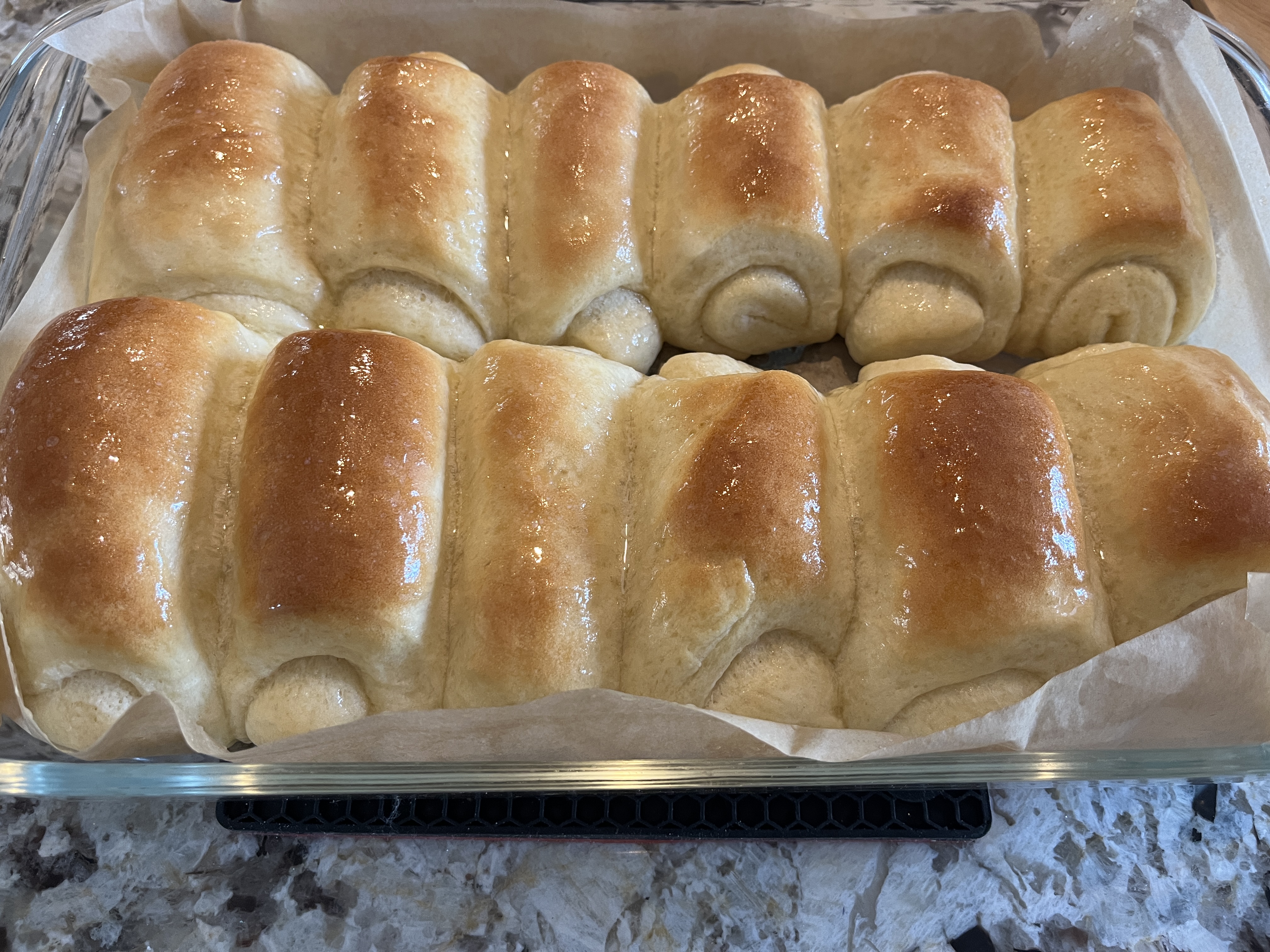 Image of Remove from oven and brush with melted butter while the...