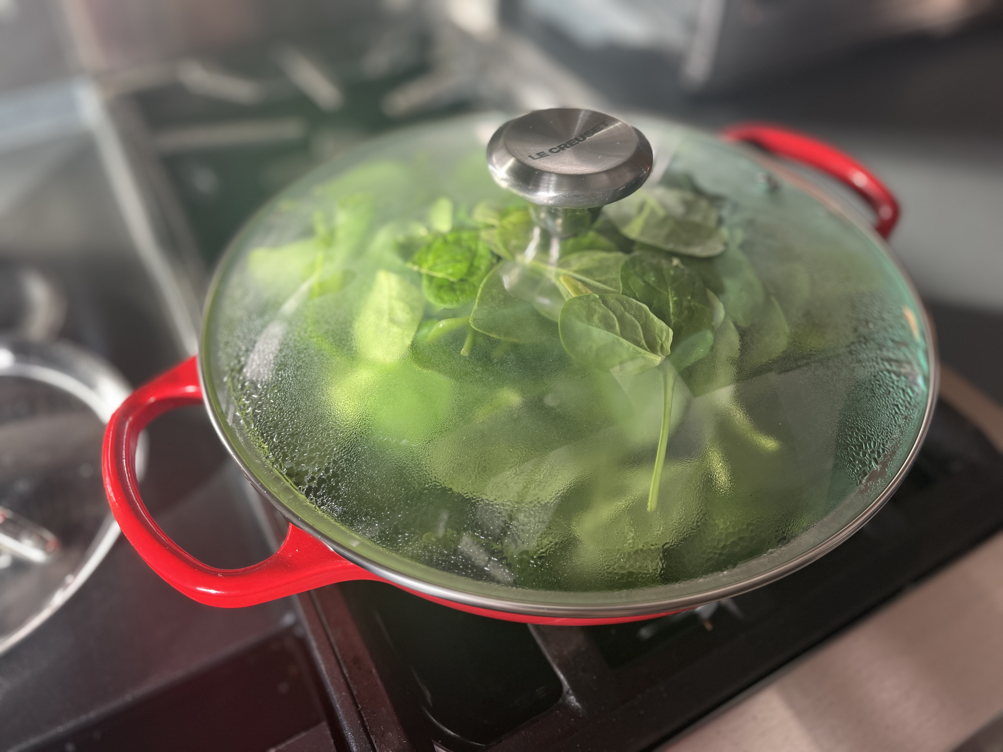 Image of Add cherry tomatoes and cook until soft. Add your spinach...