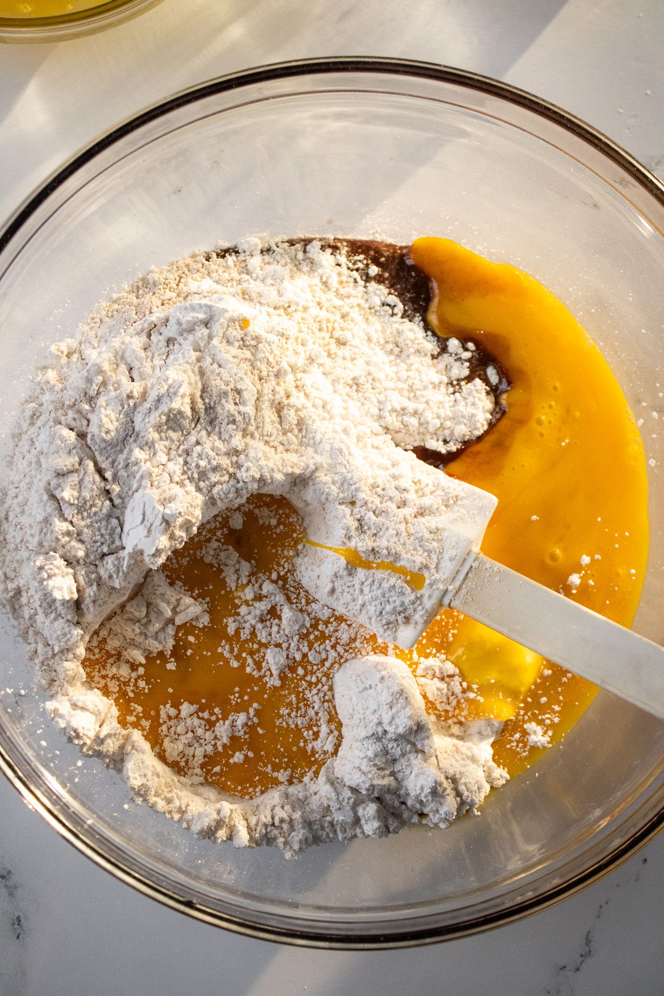 Image of Mix together flour, sugar, and salt. Add in eggs and...