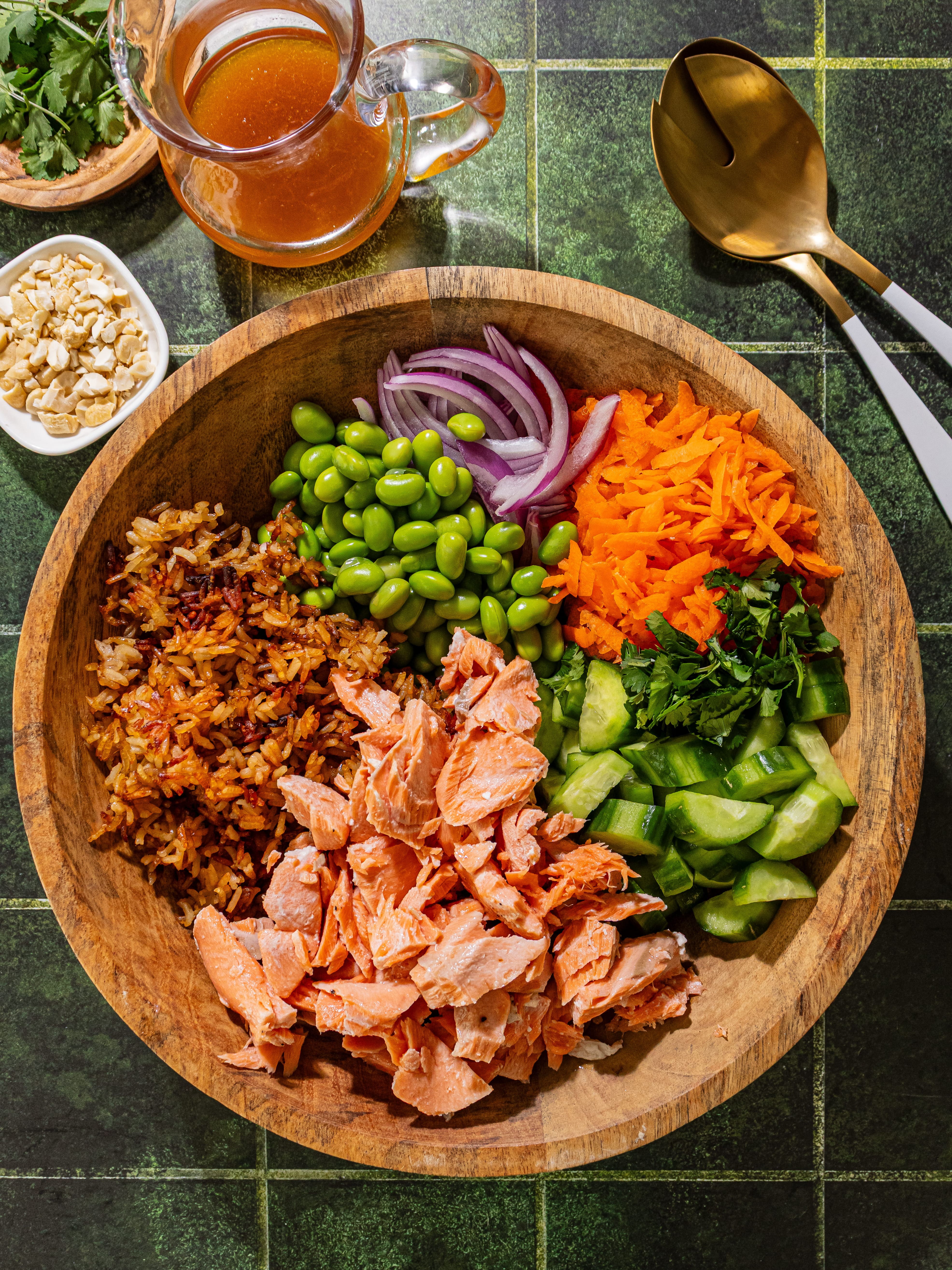 Image of Add cucumber, edamame, carrots, and red onion, and cilantro to...