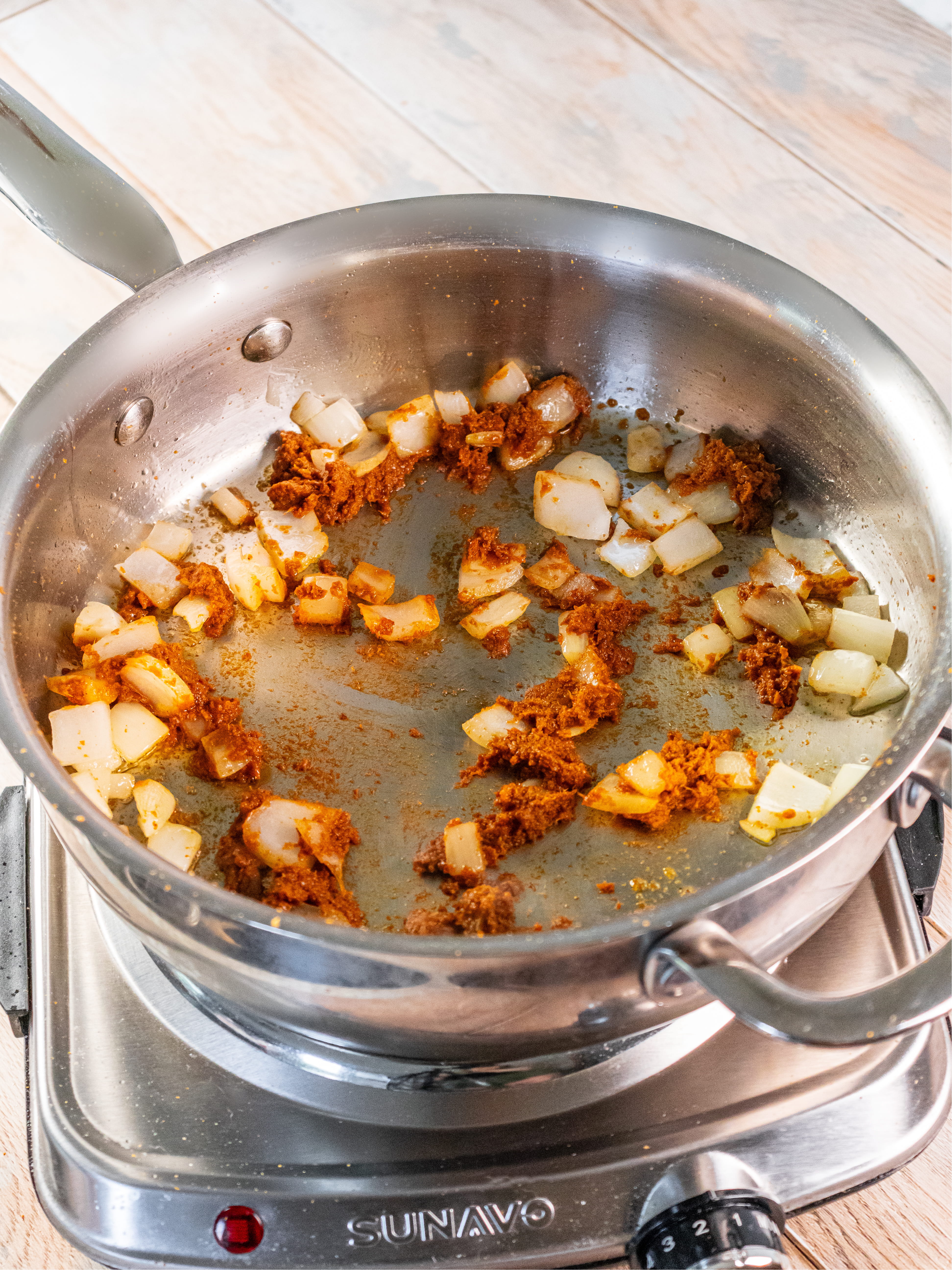 Image of Heat the coconut oil in a large deep skillet or...