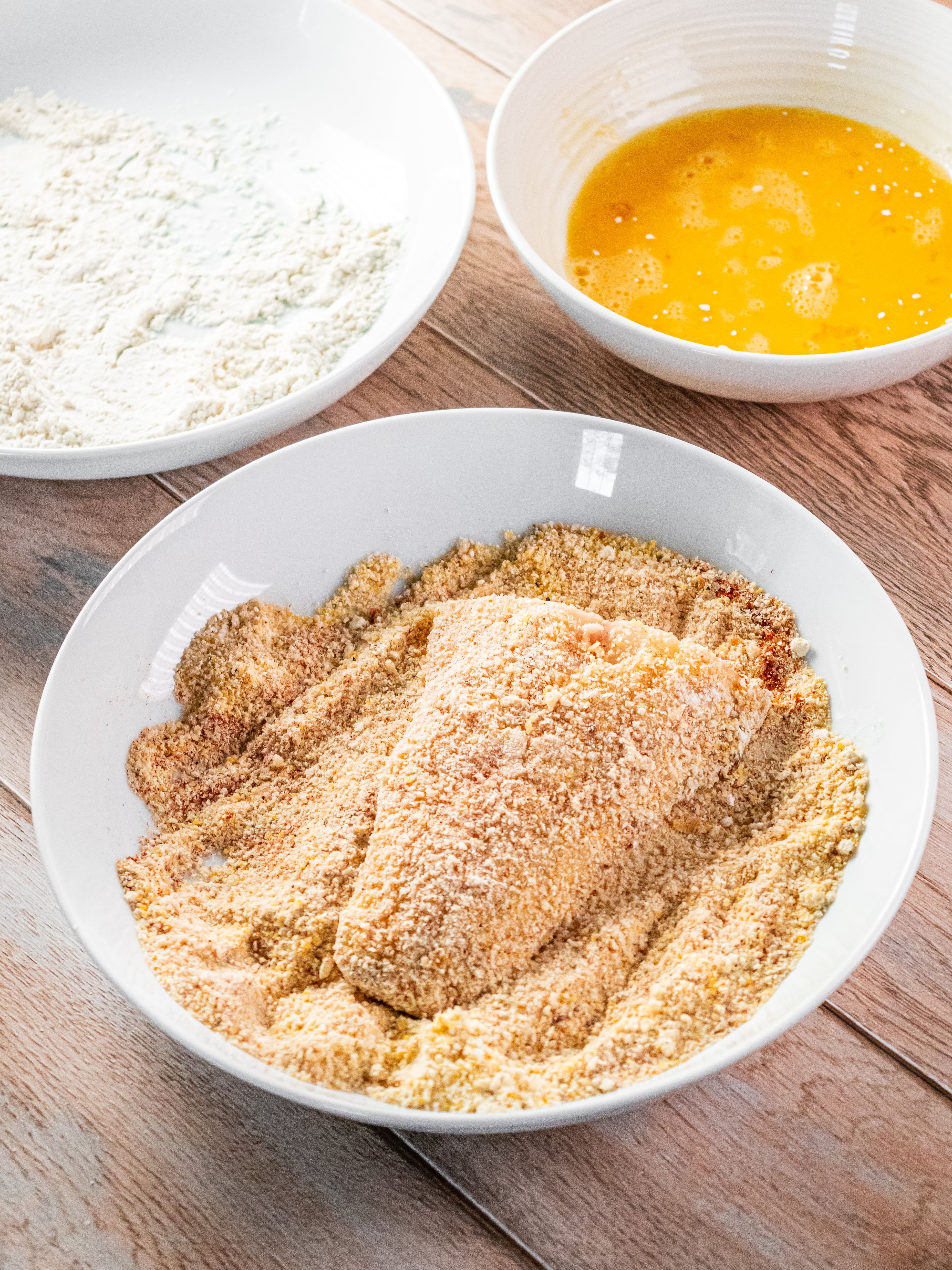 Image of Dredge each fillet in flour, shake off excess. Dip in...