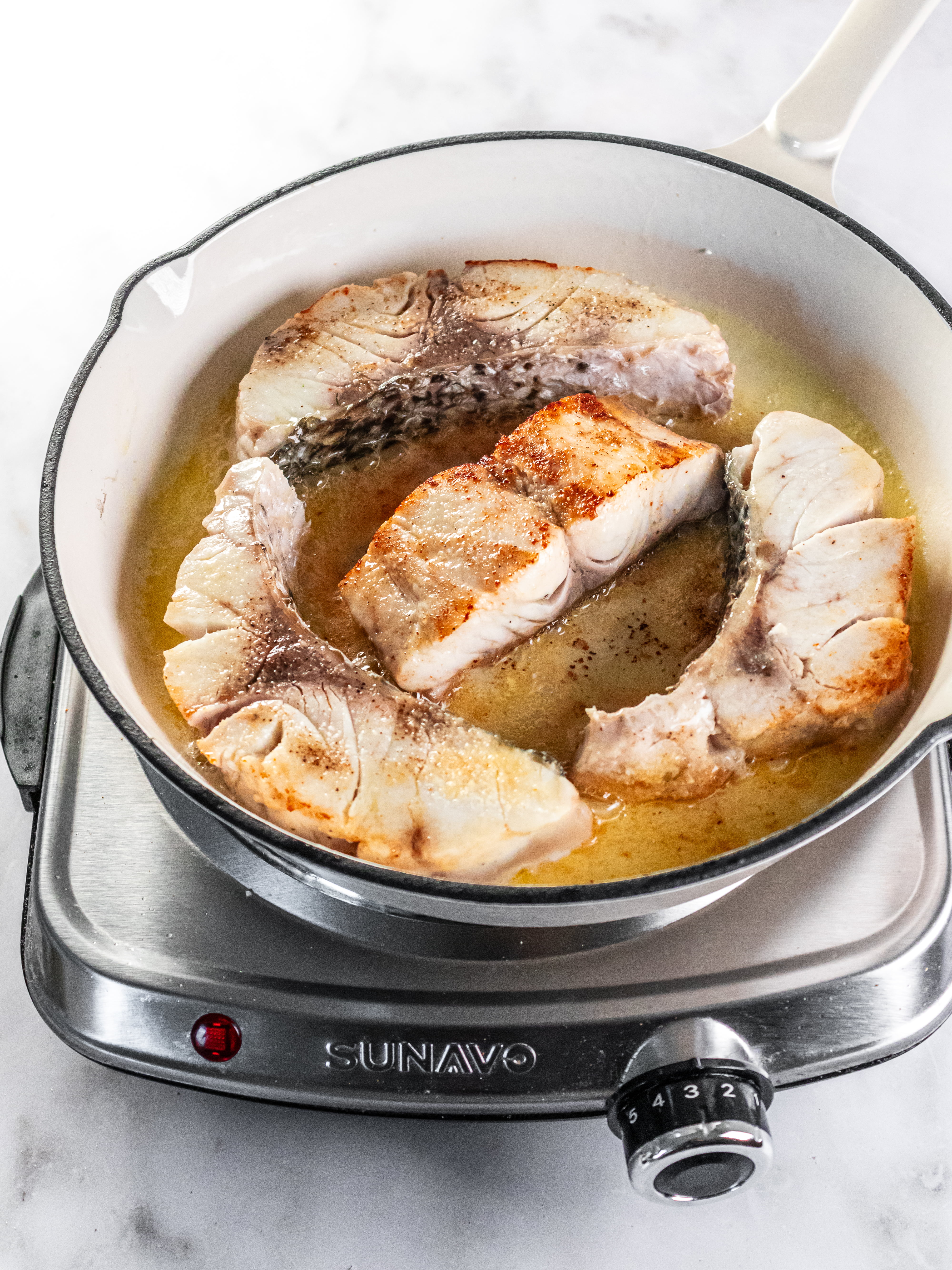 Image of Heat butter in a large skillet over medium-high heat. Once...