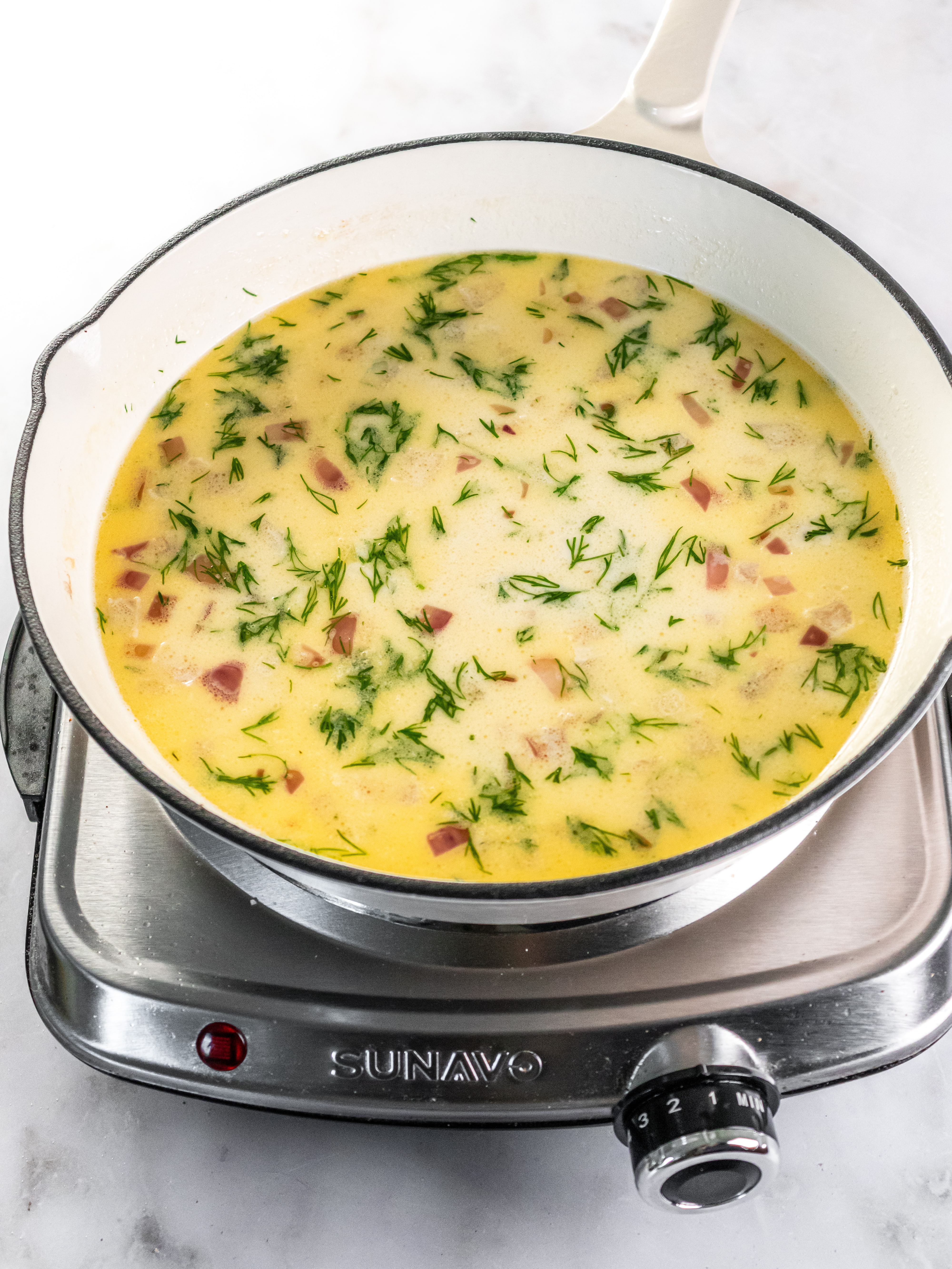 Image of Add broth, heavy cream, dill, and Dijon mustard.  Simmer gently...