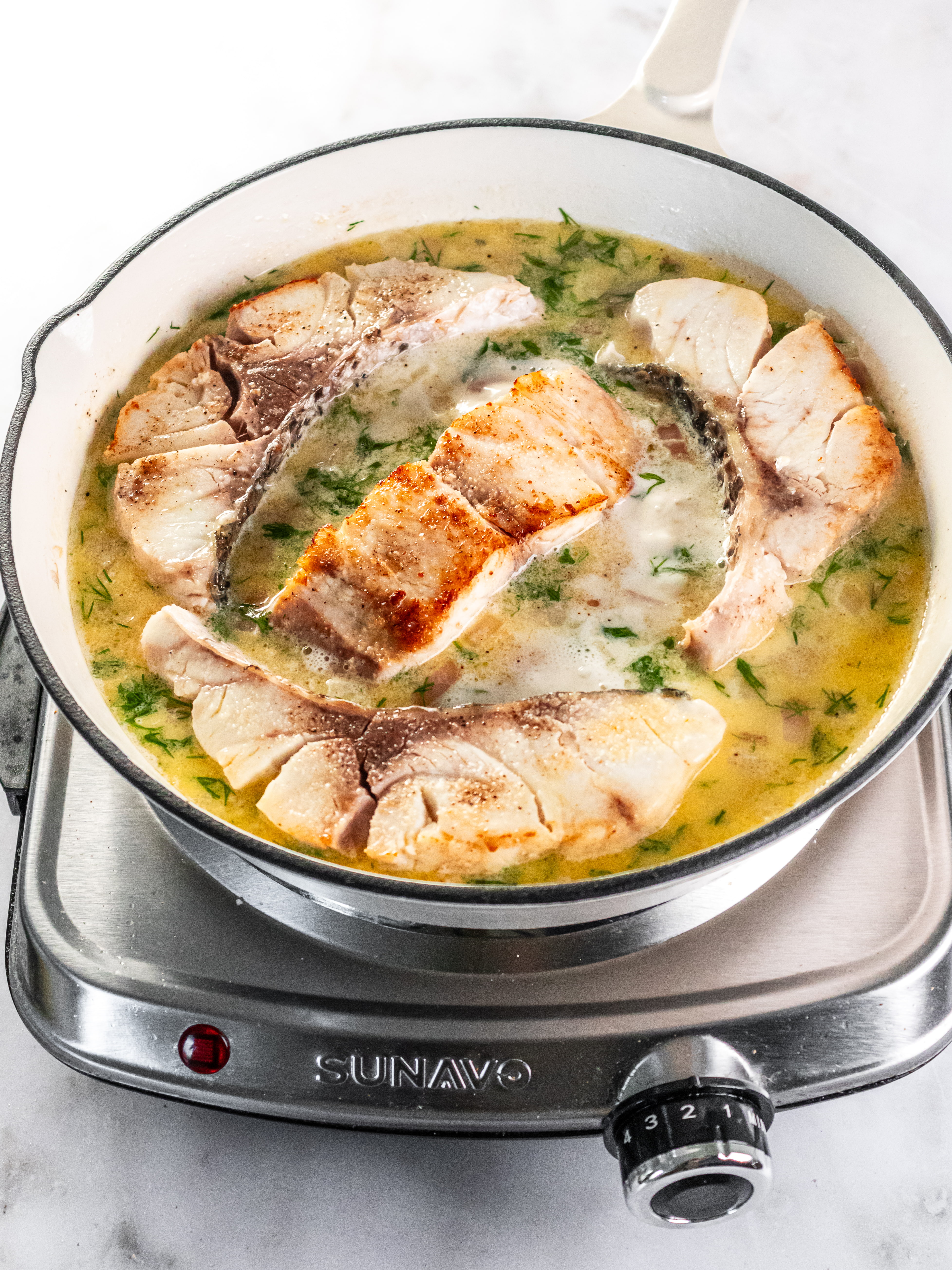 Image of Return fish to pan and spoon the hot white wine...