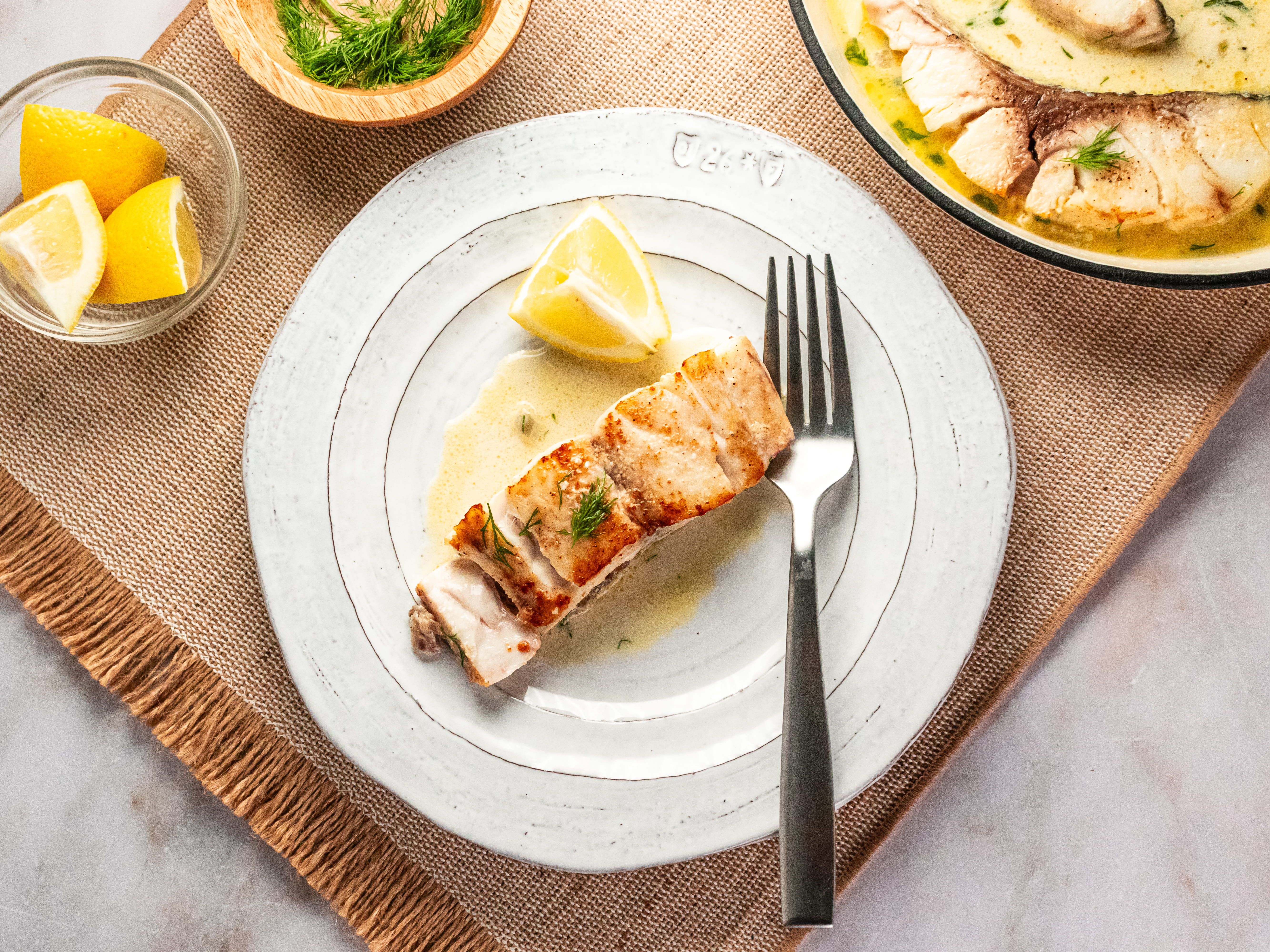 Image of Serve with lemon wedges.