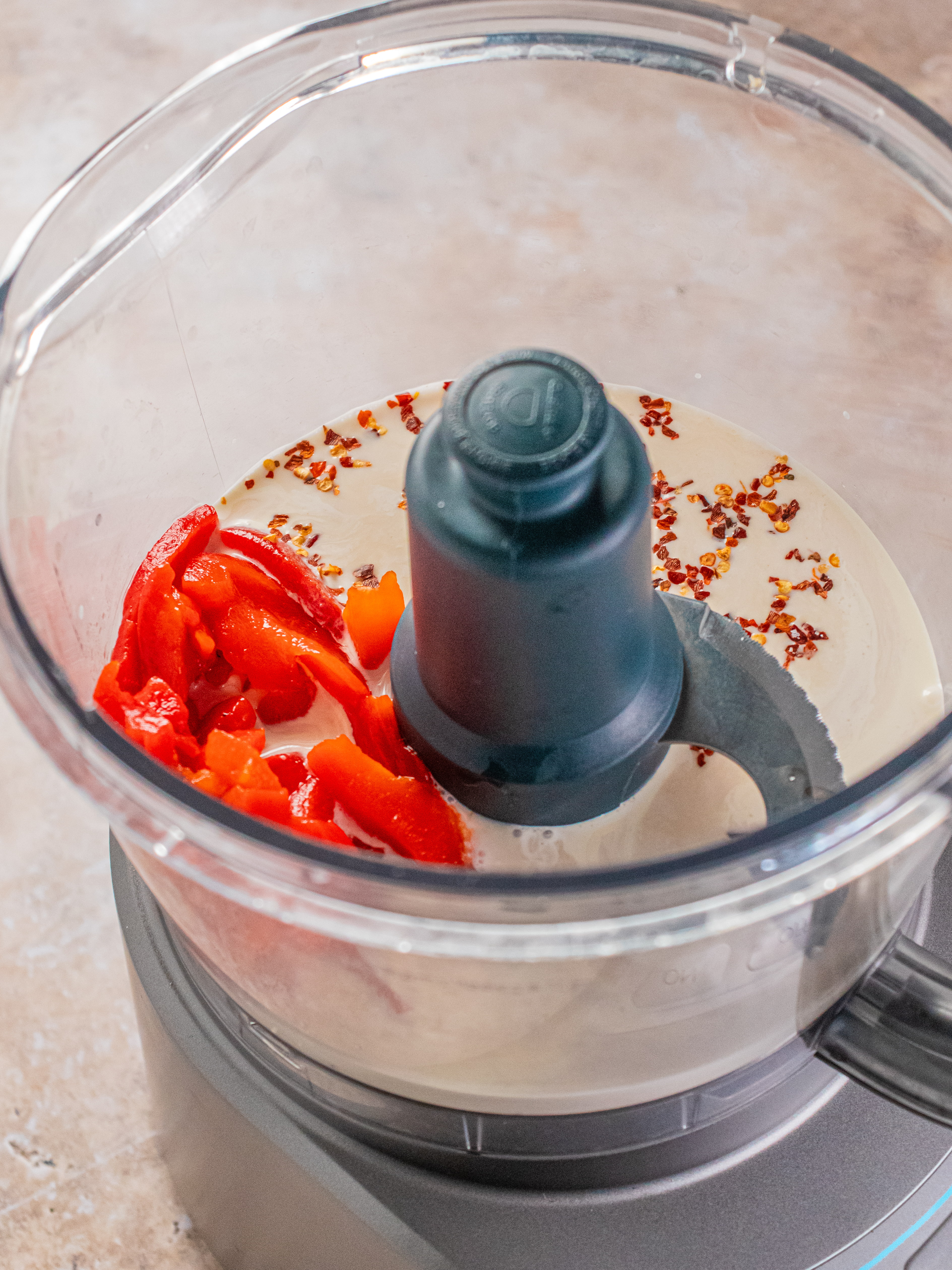 Image of Combine ingredients for sauce in a food processor or high-powered...