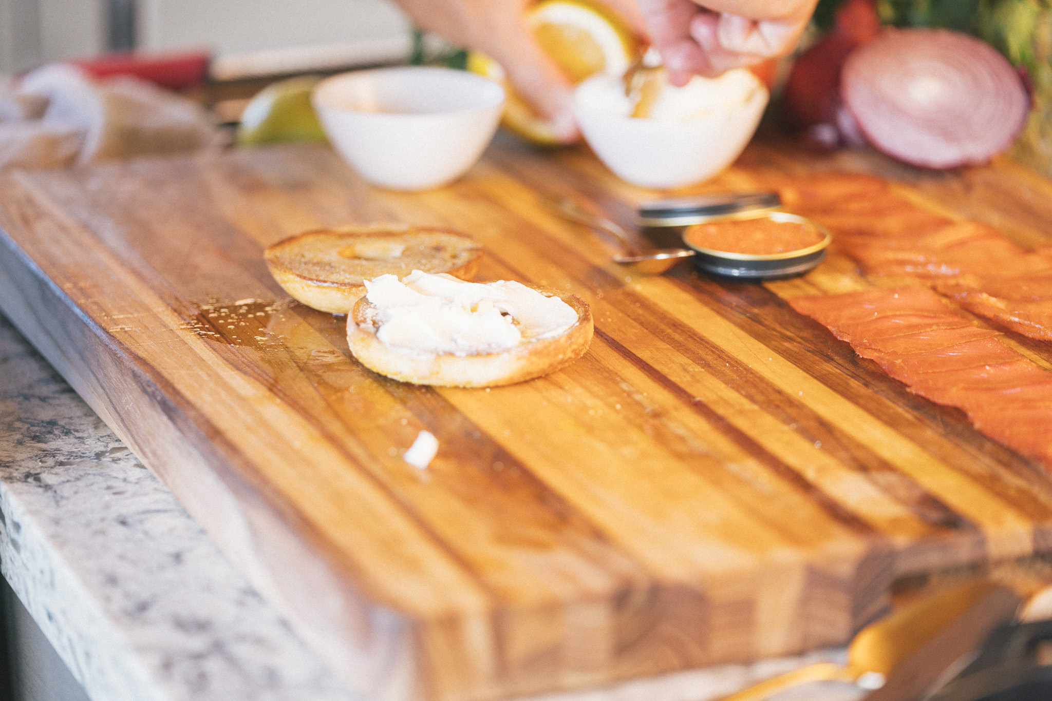 Image of Spread a generous layer of cream cheese onto the toasted...