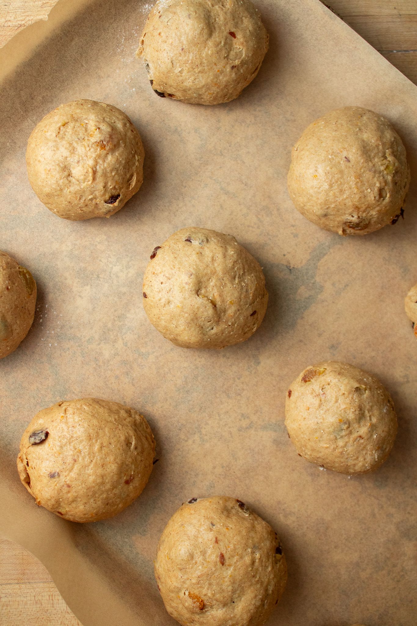 Image of Line a baking tray with parchment paper. Divide dough in...