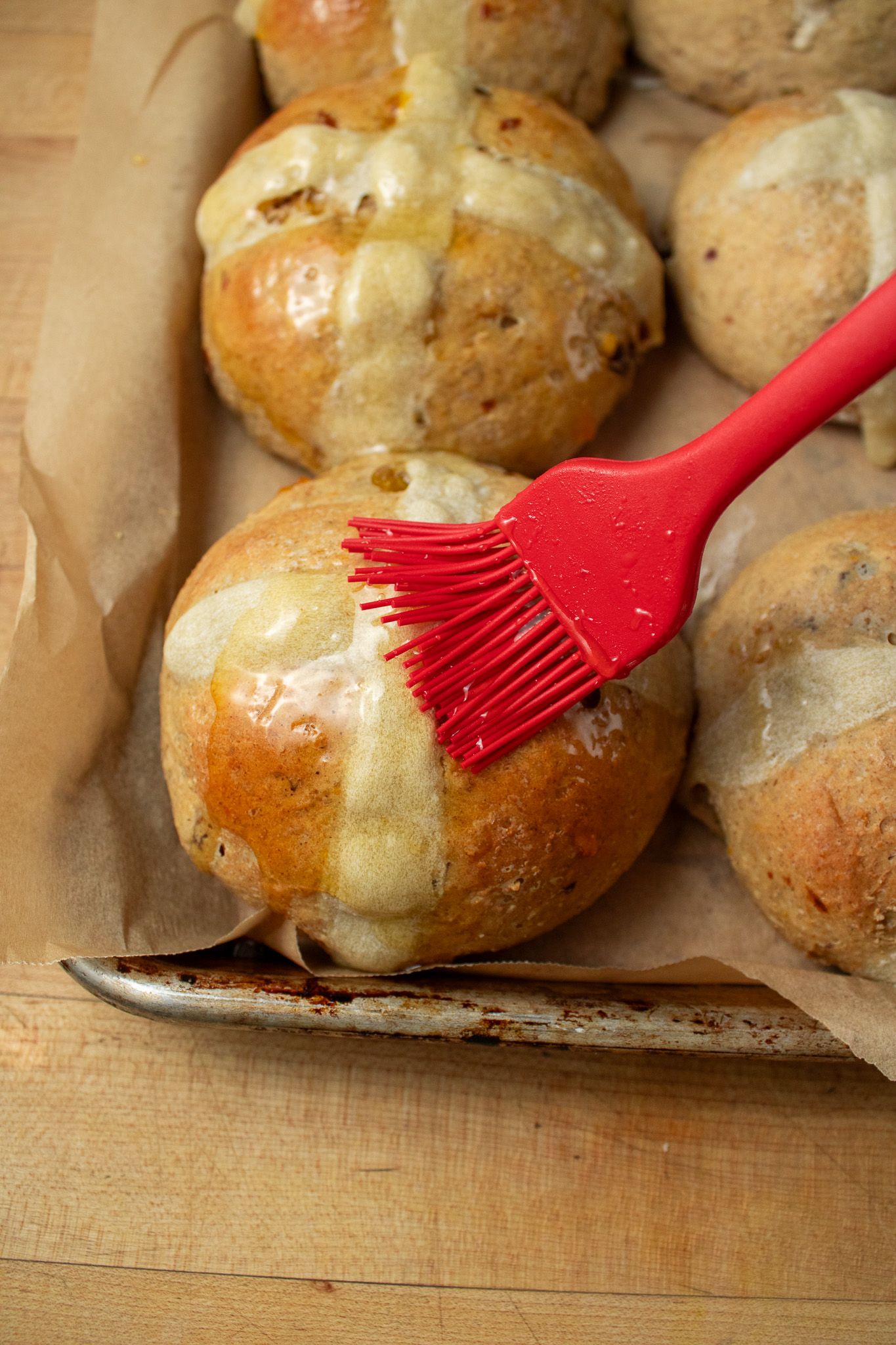 Image of Brush with jam mixture while the buns are still warm....