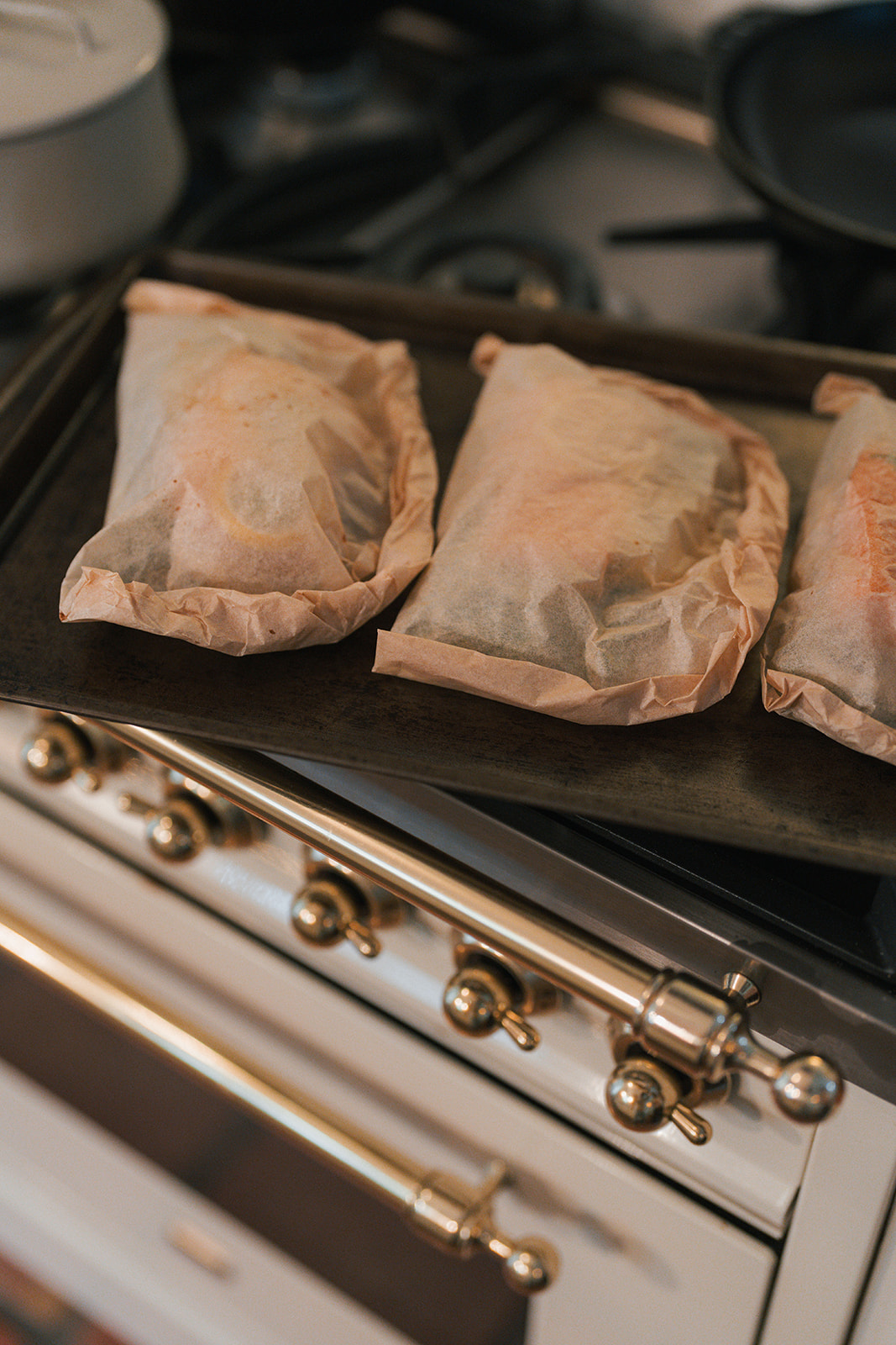 Image of Bake: Place the pouches on a large rimmed baking sheet...