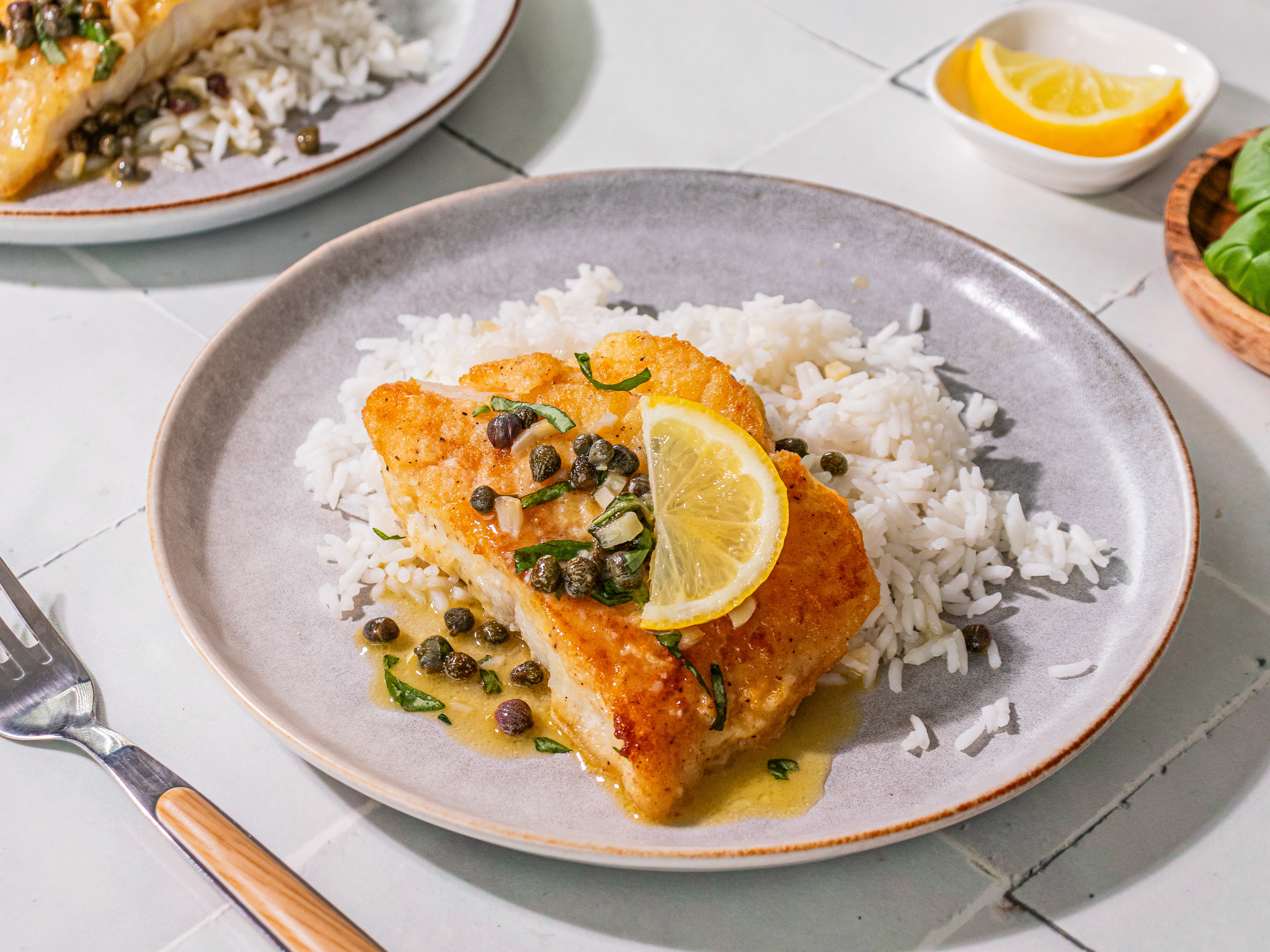 Image of Serve hot topped with lemon slices and fresh basil or...