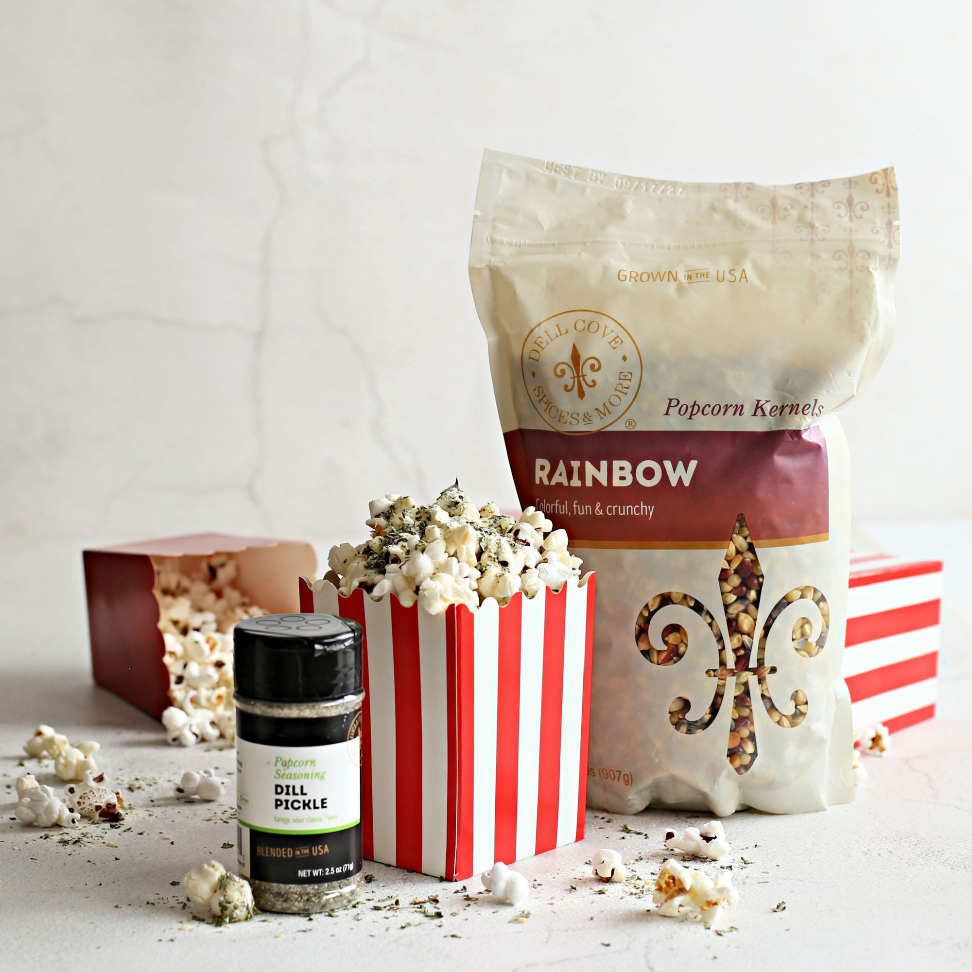 Image of Pour the melted butter over the warm popcorn. Sprinkle on...