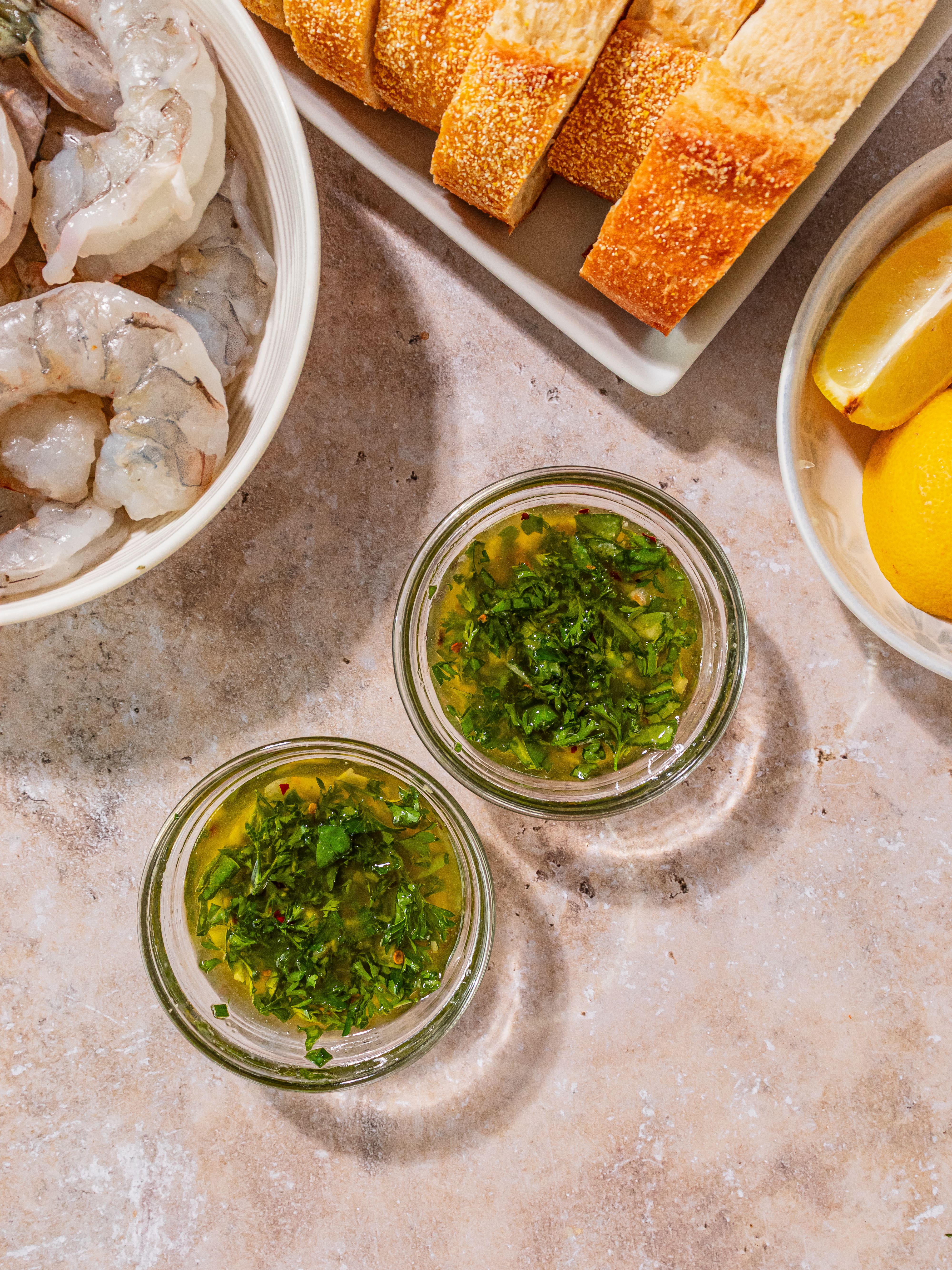 Image of Stir together olive oil, melted butter, garlic, parsley, basil, salt,...