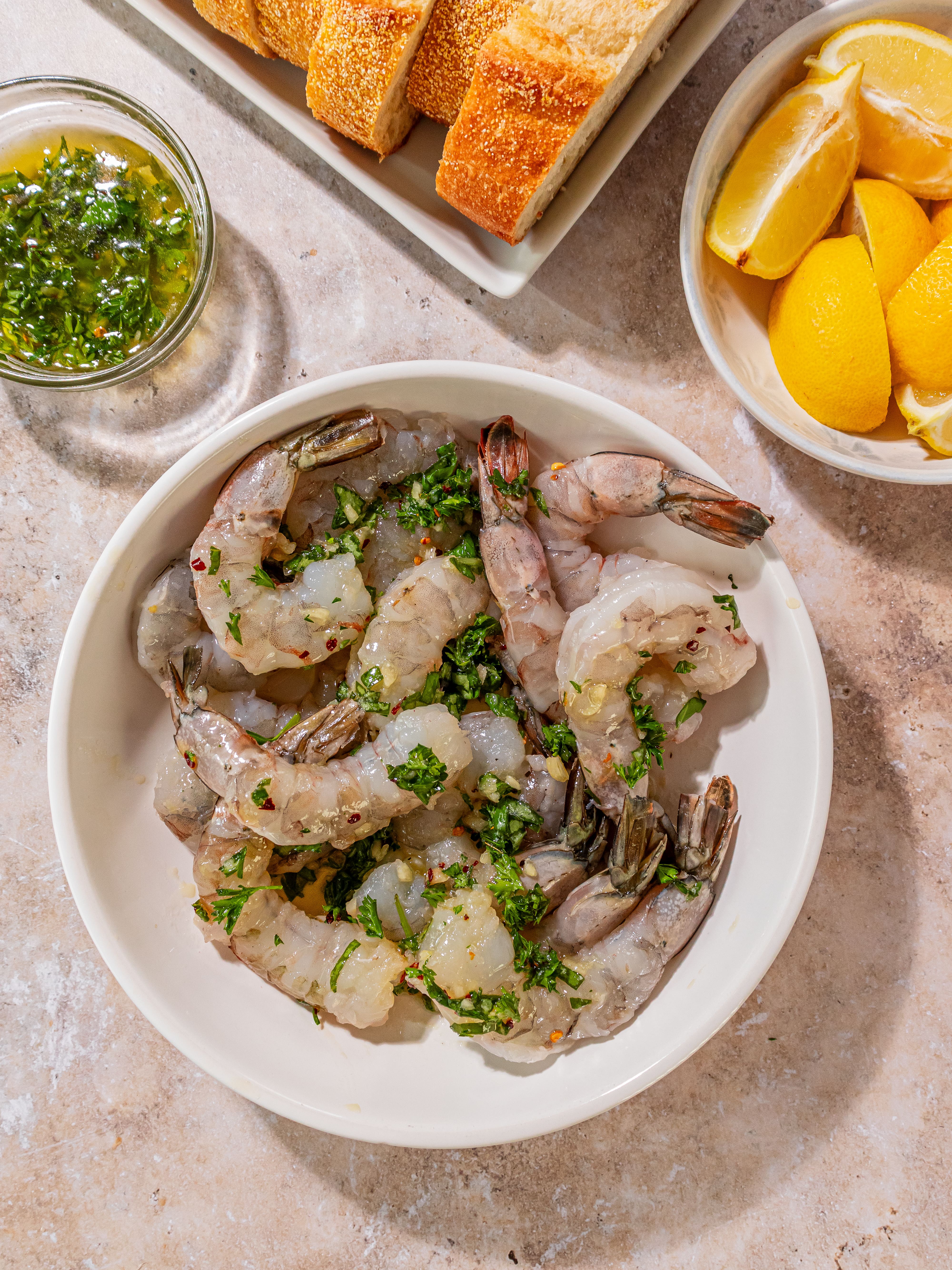 Image of Blot shrimp with paper towels to remove excess moisture. Add...
