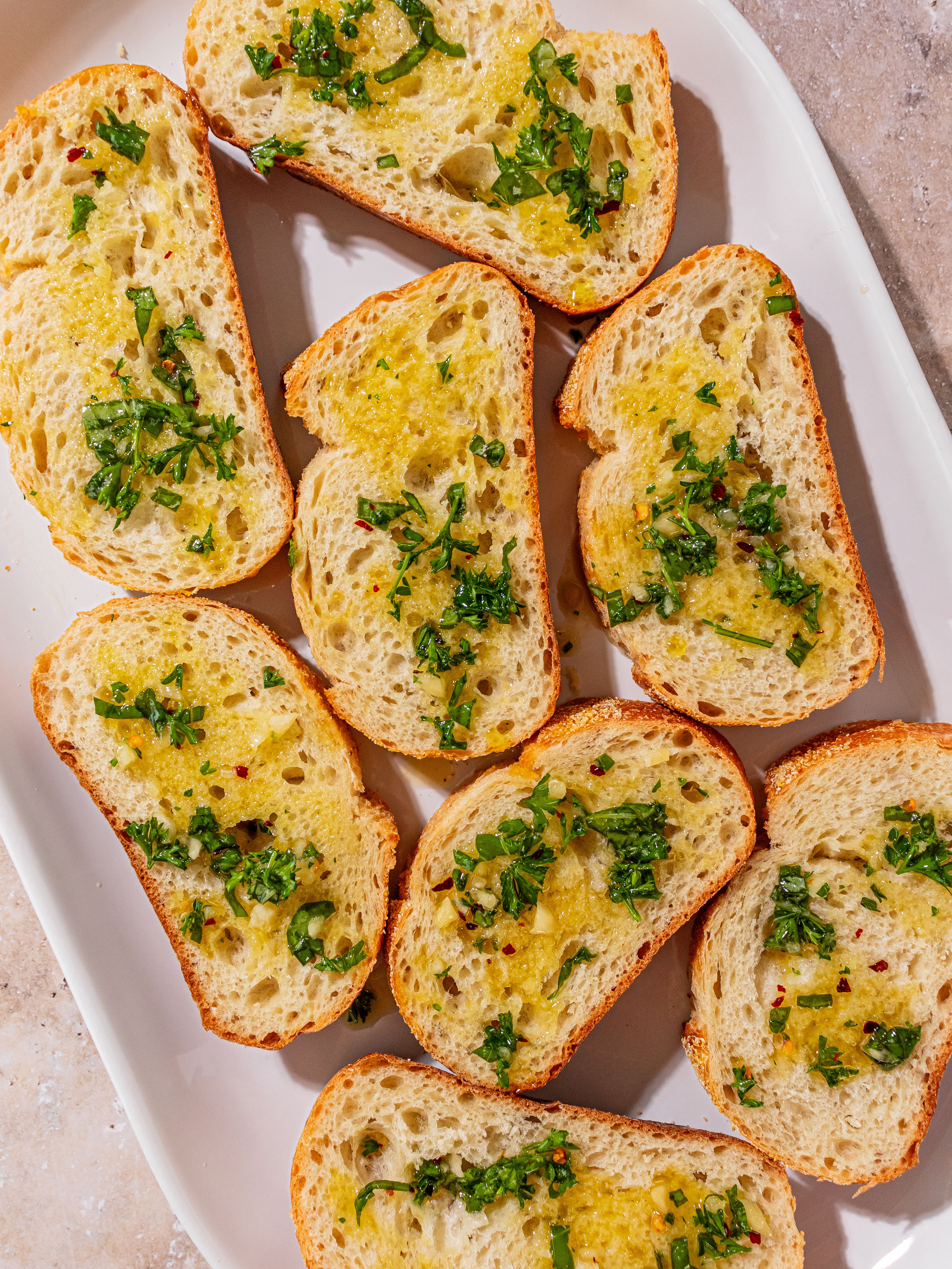 Image of Set sliced bread on a tray and brush with the...