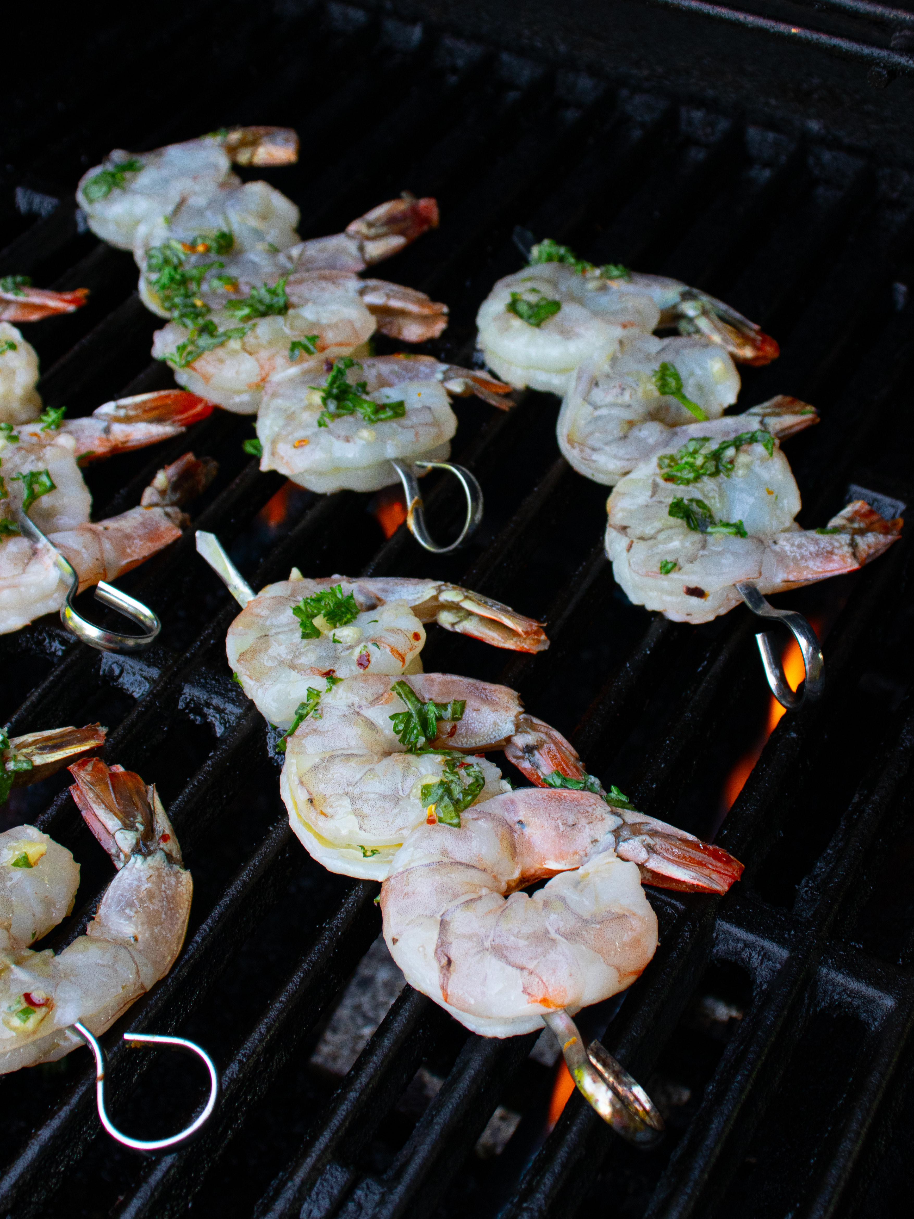 Image of Place shrimp skewers on grill and cook for 3-4 minutes....