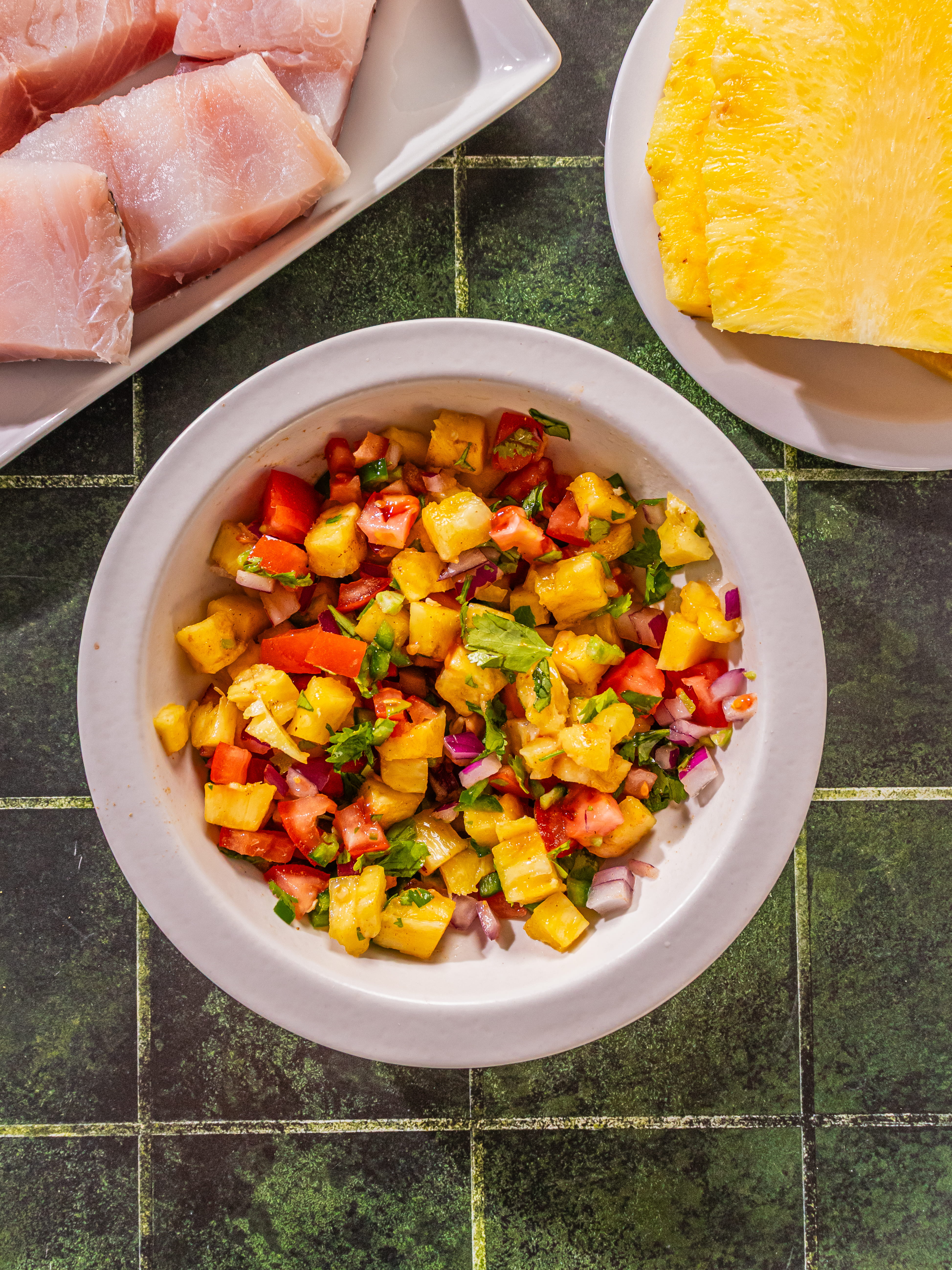 Image of Dice the remaining pineapple and add to a small bowl...