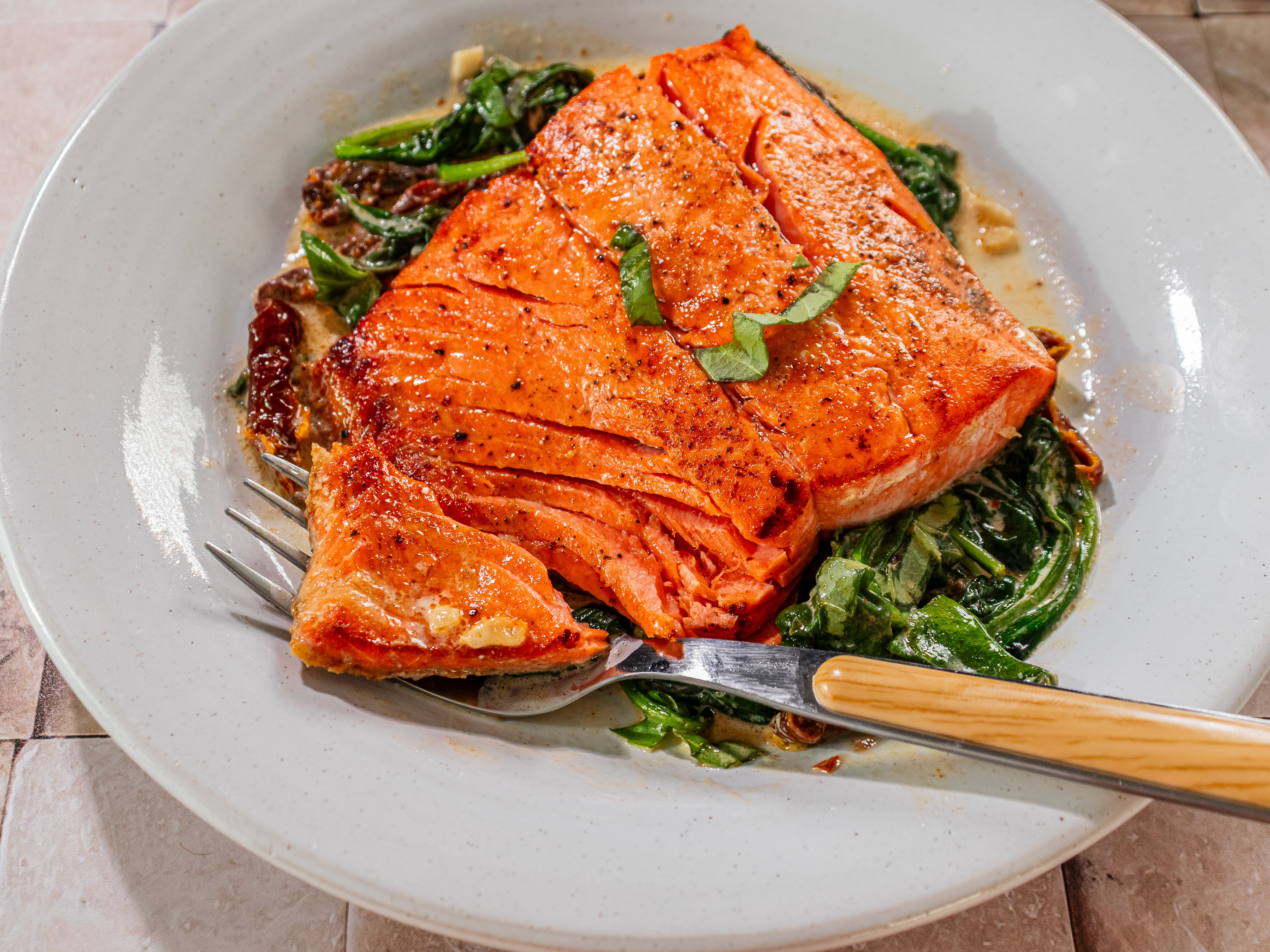 Image of Serve hot garnished with fresh chopped basil.