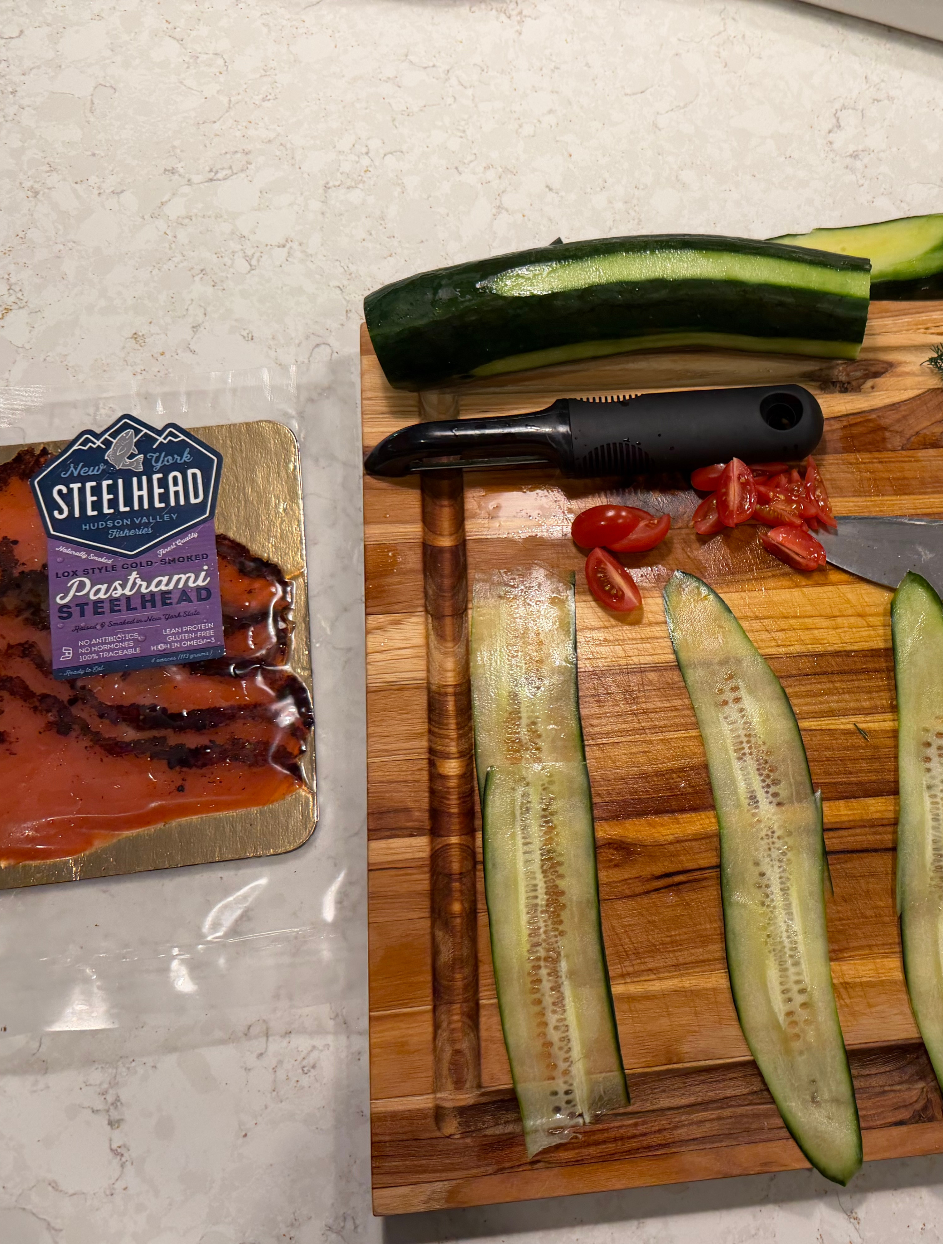 Image of Cut grape tomatoes into quarters or small wedges.